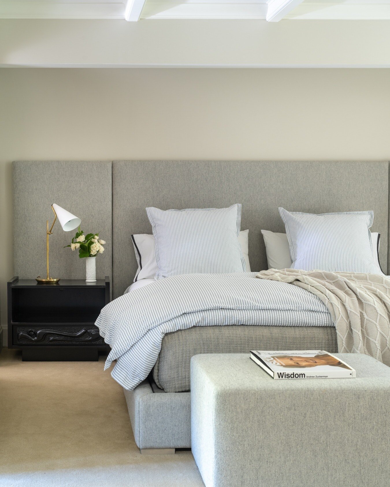Cozy fabrics create a lush bedroom.