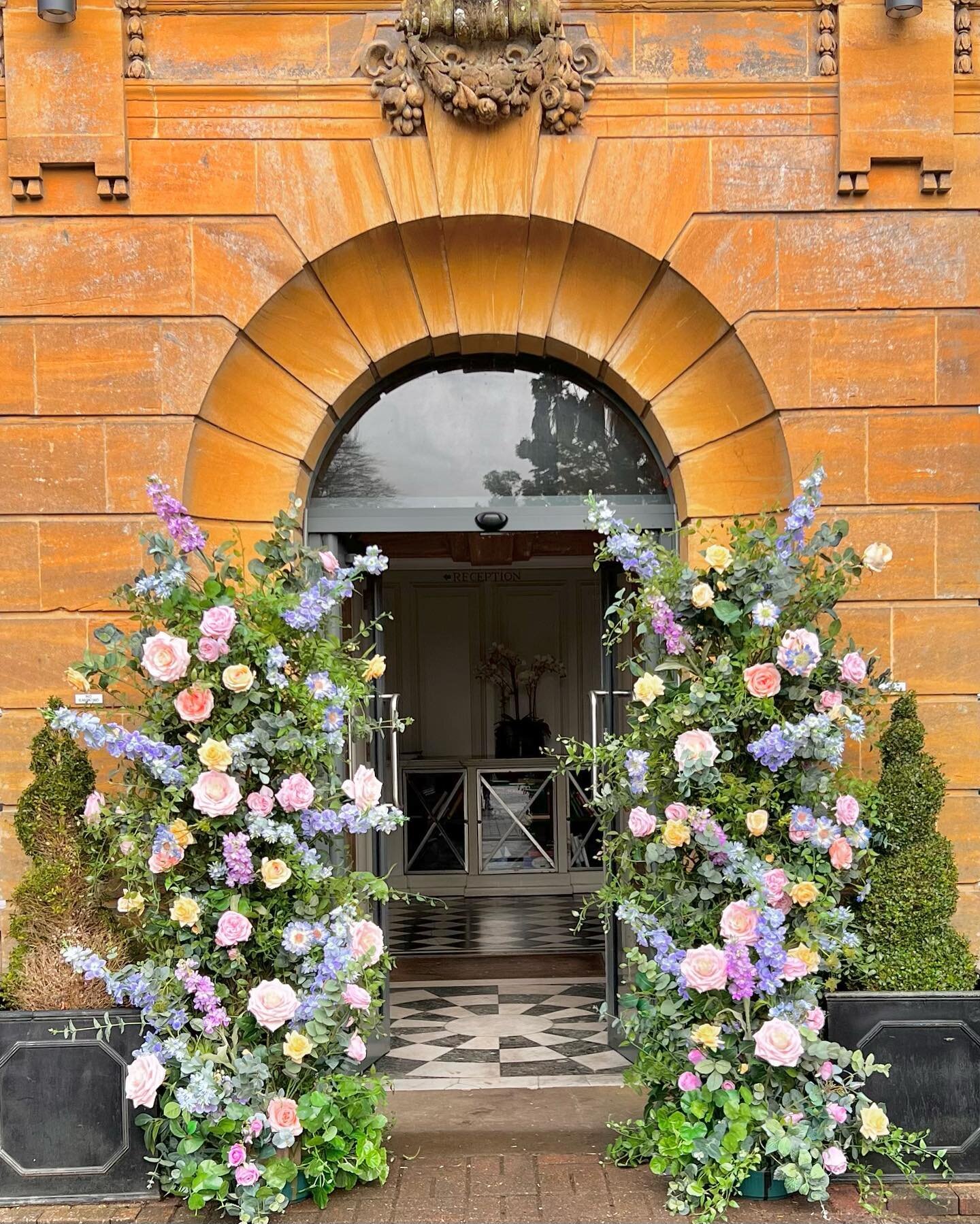 Floral pillars are so popular. They can be repositioned much easier than an arch. Use to dress a gazebo or grand entrance then move inside to add wow factor at the wedding breakfast.  #guildfordwedding #weddingfloristguildford #fauxweddingflower #bar