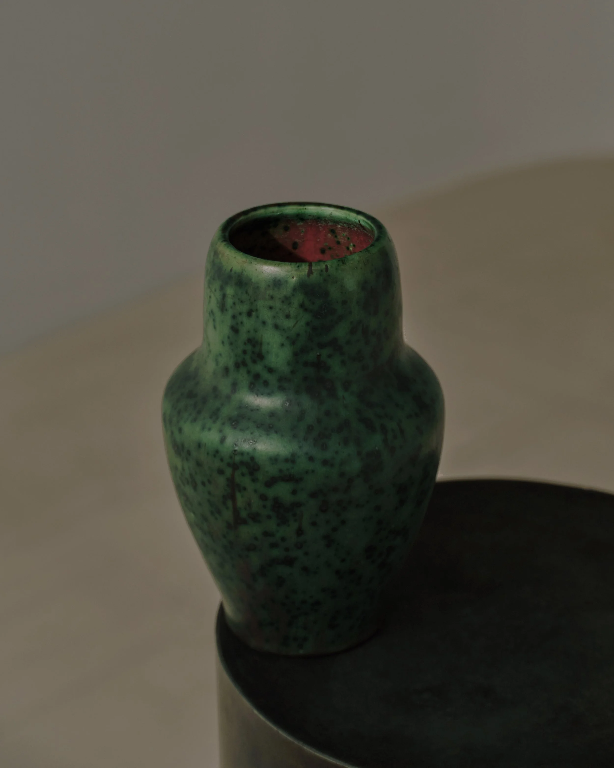 Pierre-Adrien Dalpayrat, jade-green glazed ceramic vase with a striking red interior, circa 1900