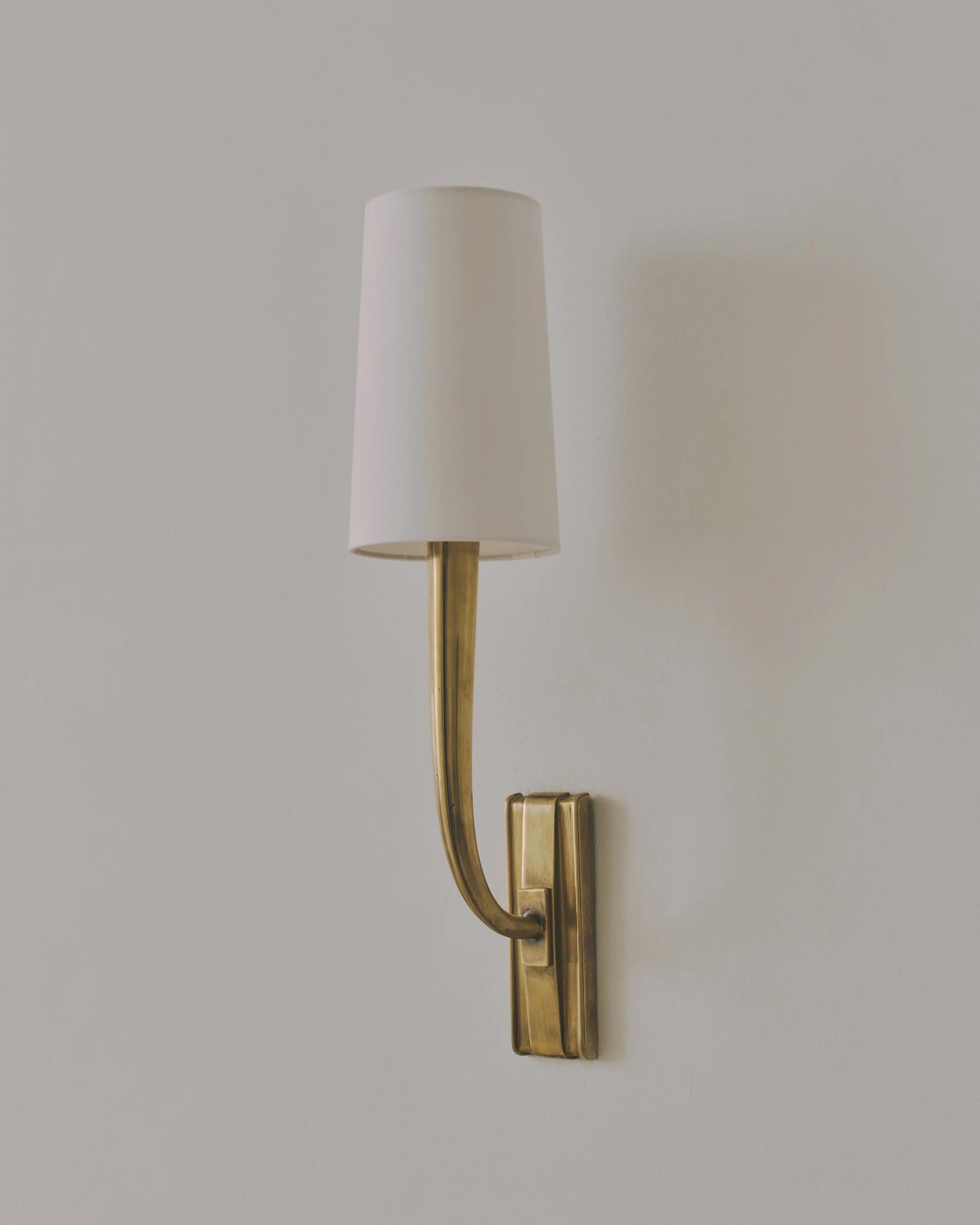 Pair of sconces in gilt bronze by Jean Pascaud, circa 1940