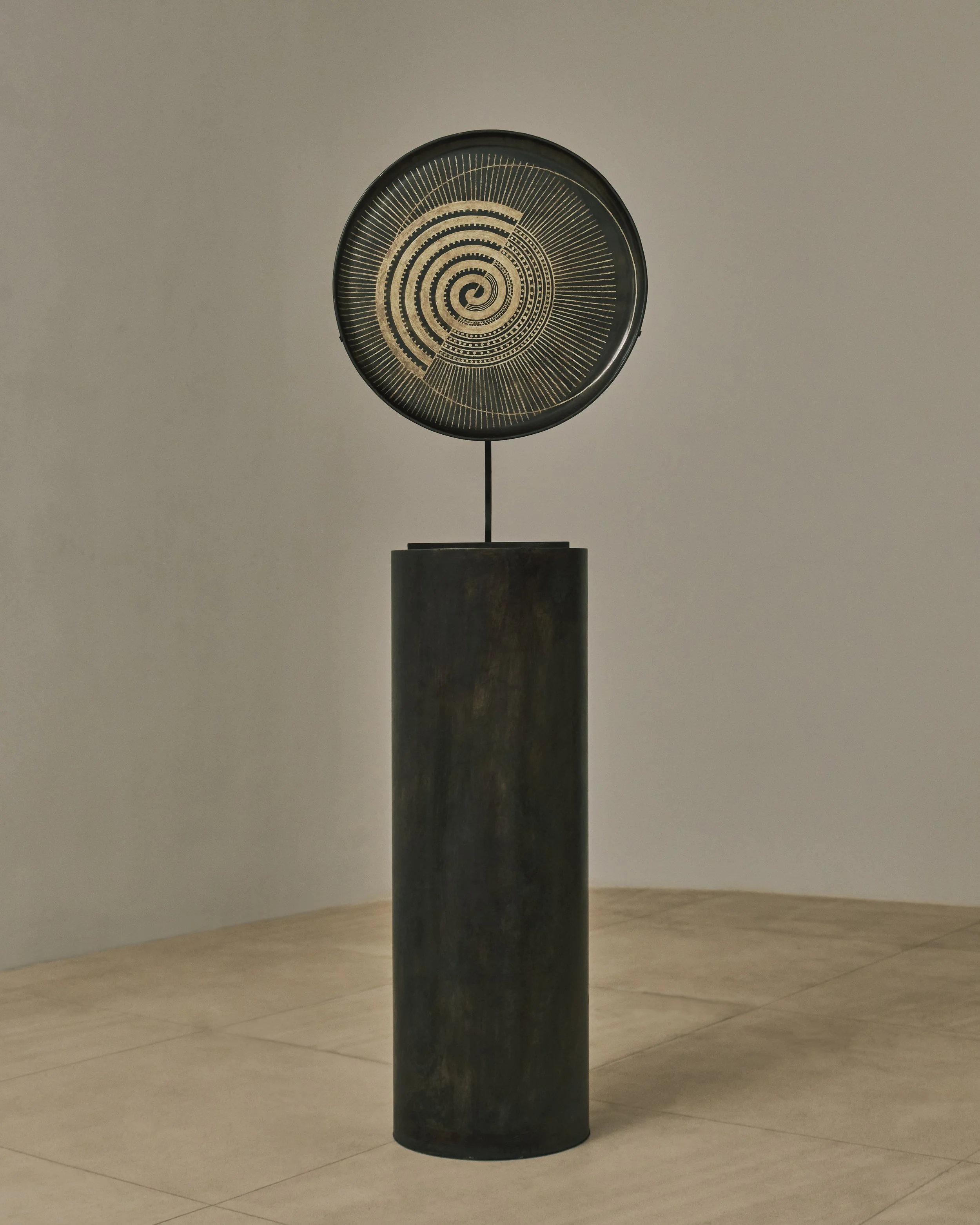 Important patinated black dinanderie plate with silver ‘spiral’ pattern by Jean Dunand, circa 1925