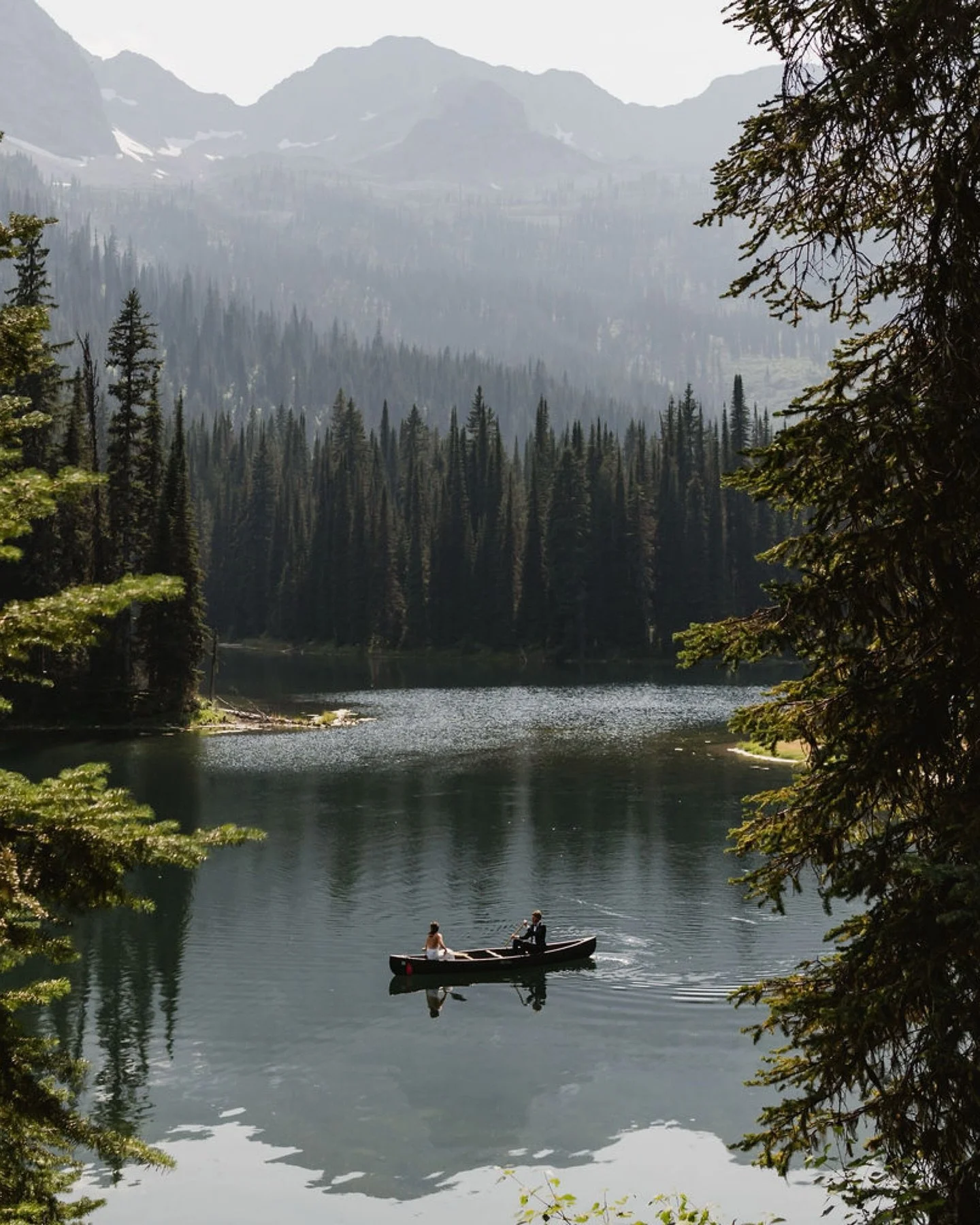 There&rsquo;s nothing quite like a summer wedding in the Canadian Rockies. Kevin + Jess exchanged vows by the water at @islandlakelodge and drifted into marriage with a relaxing (and stunning!) mountain lake canoe ride. 

We would relive this perfect