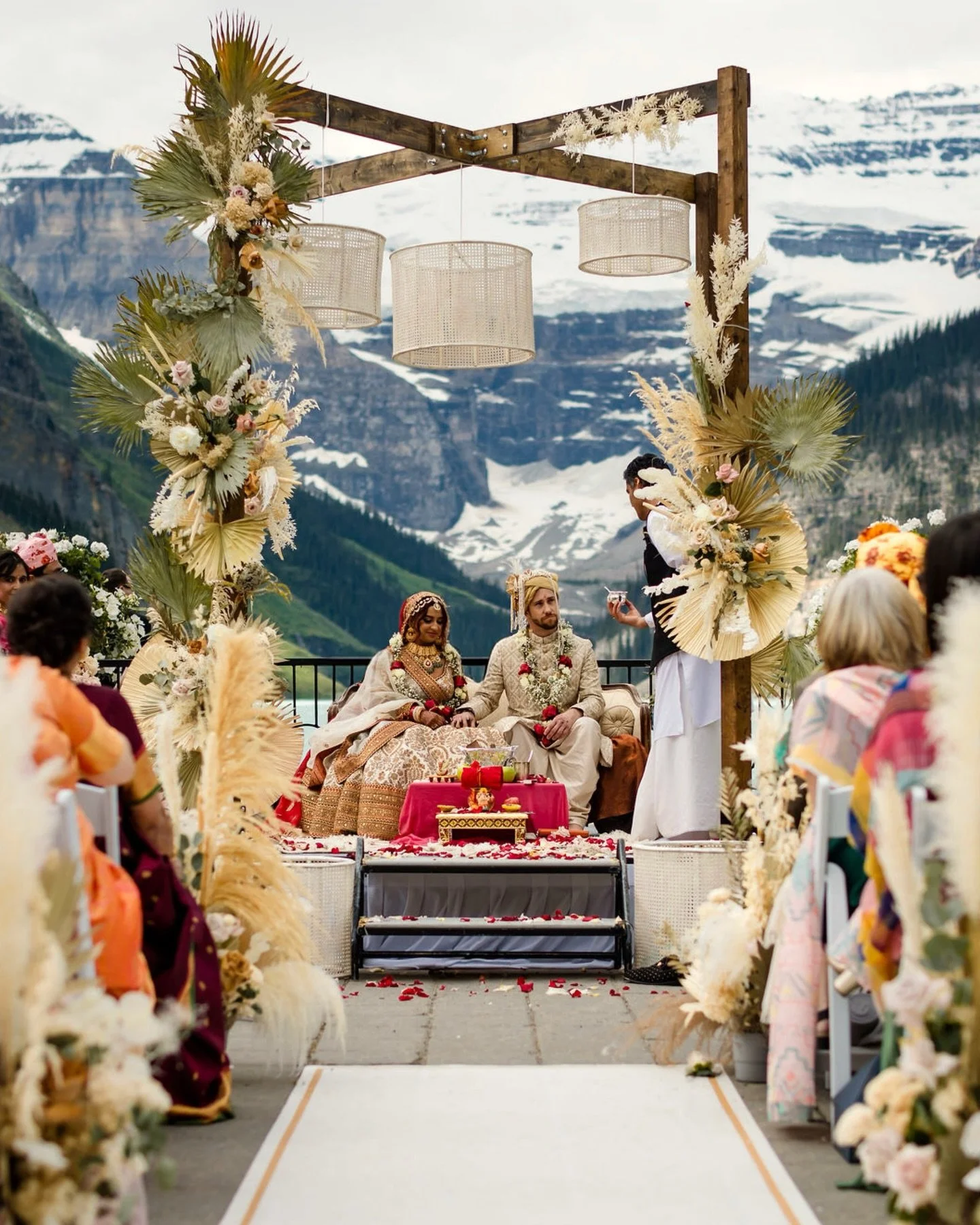 Time to add a little colour to this feed ✨ 

Sometimes we still feel like this weeklong celebration with Surbhi + Kyle was a surreal dream.

The grandeur of this multi day wedding paired with the raw beauty of the Canadian Rockies is a combination we