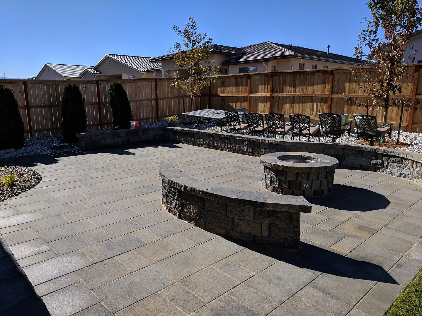 Landscape design Carson City NV with paver patio and outdoor fireplace