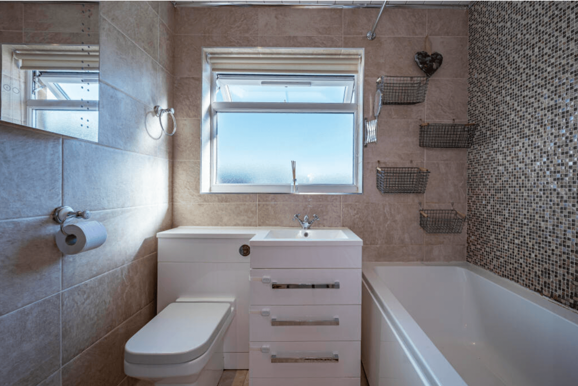 Original small family bathroom in 1970s Lenzie villa before renovation Caption: The original bathroom — functional, but built for a quick wash rather than winding down.