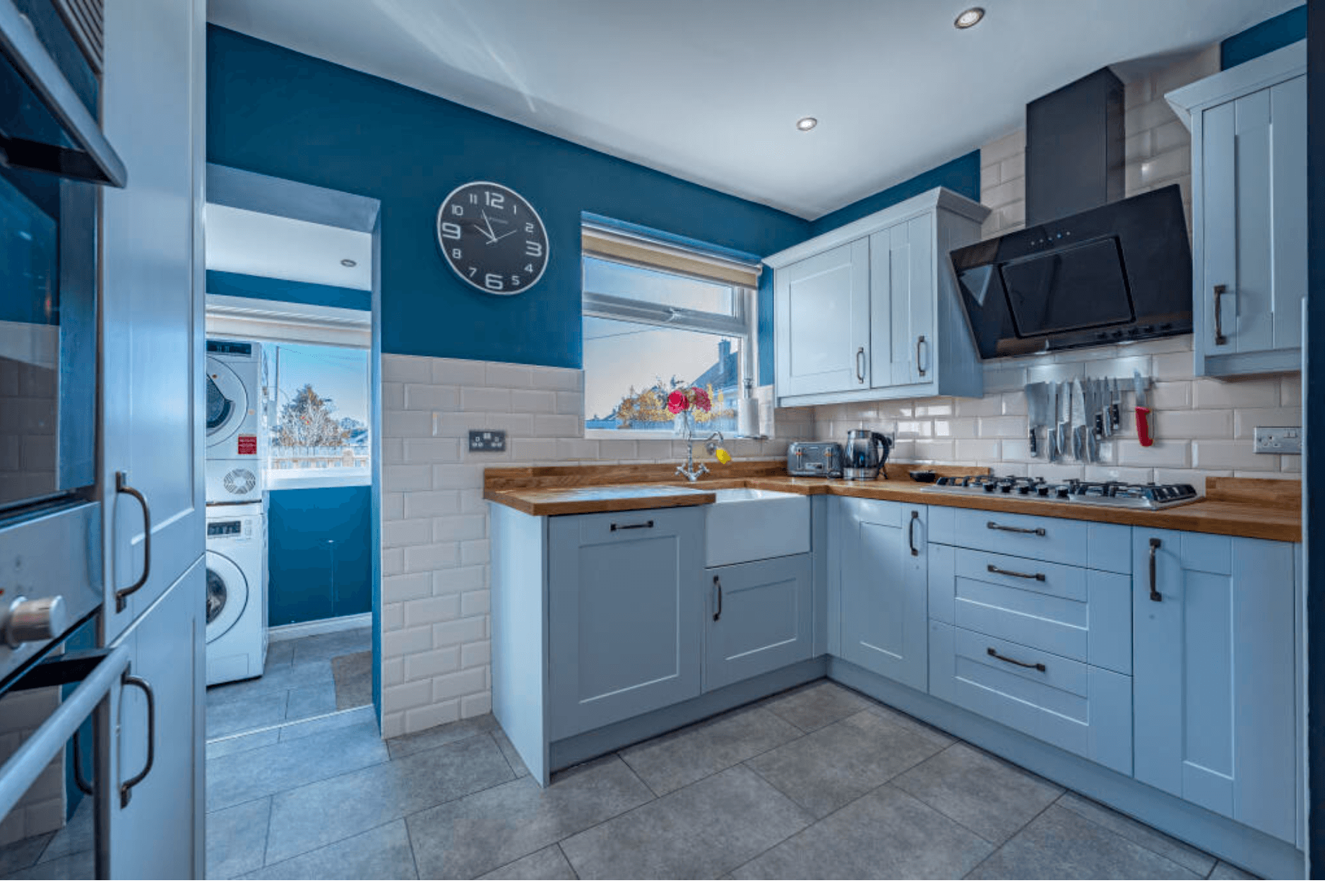 Original 1970s kitchen in Lenzie villa before renovation, closed off from utility room