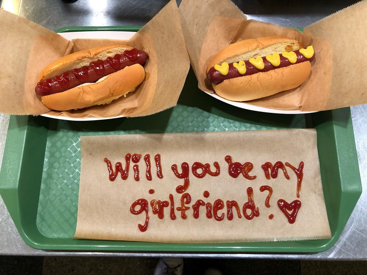 SPOILER ALERT: she said yes! 
&bull;
We love a good special request like this one 🌭 ❤️ 
#hotdogs #hotdoglovers #letuscateryourwedding #loveisintheair