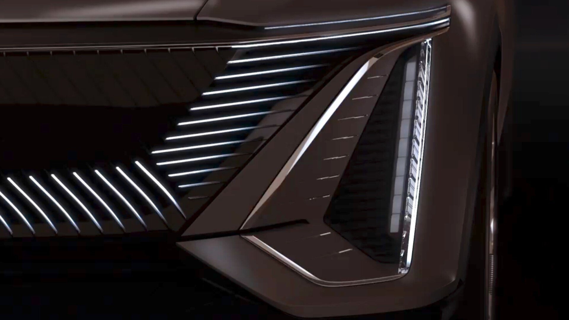 cadillac-lyriq-front-corner--from-teaser-video-june-2020_100750103.jpg