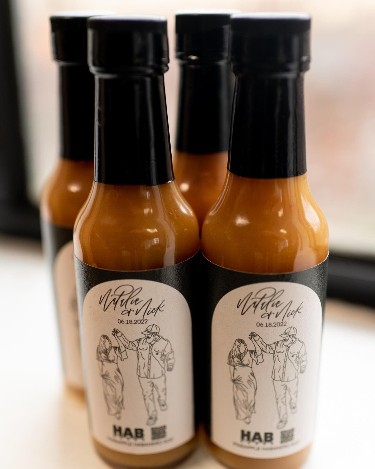 A little close up of the custom labels we made for Nick and Natalie&rsquo;s wedding last summer. These Pineapple Habanero @habsauce were not only the guest favors but they also had escort tags around their necks and paired perfectly with the Hawaiian