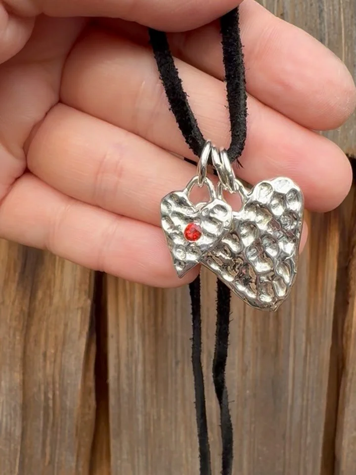 hearts on hearts! solid sterling silver, thick and chunky and weighty and so satisfying 😮&zwj;💨 large one without stone and small one with a spicy fire opal available! dm to make &lsquo;em yours ❤️