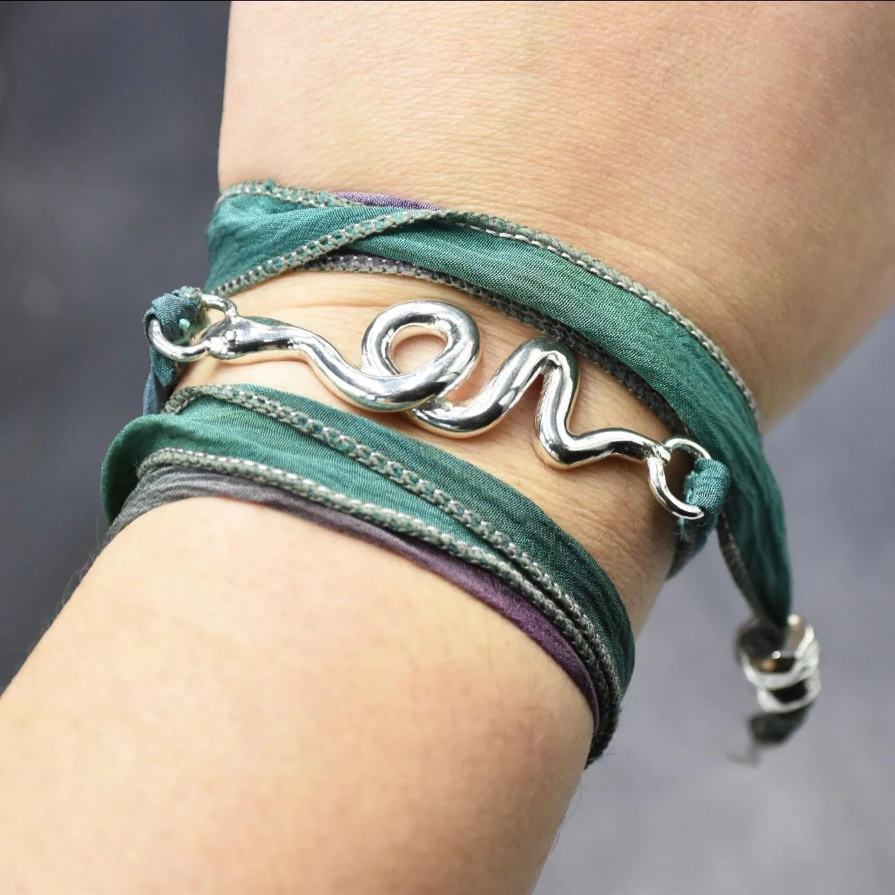 added some chunky beads to help the wrap bracelet stay put more easily 🤓 #snakes #snakejewelry #silversmith #wrapbracelet