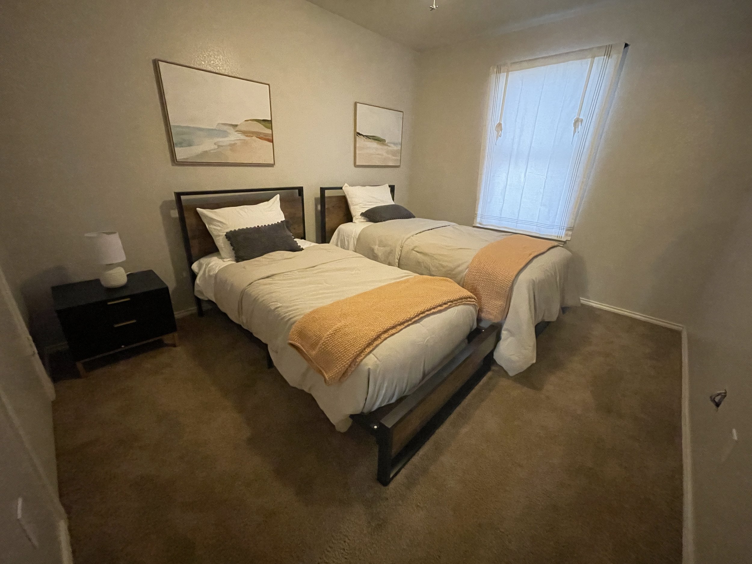 Bedroom 2 Includes: 2 Twin Sized Beds, Clean Sheets, Comforter, Pillow, and Nightstand