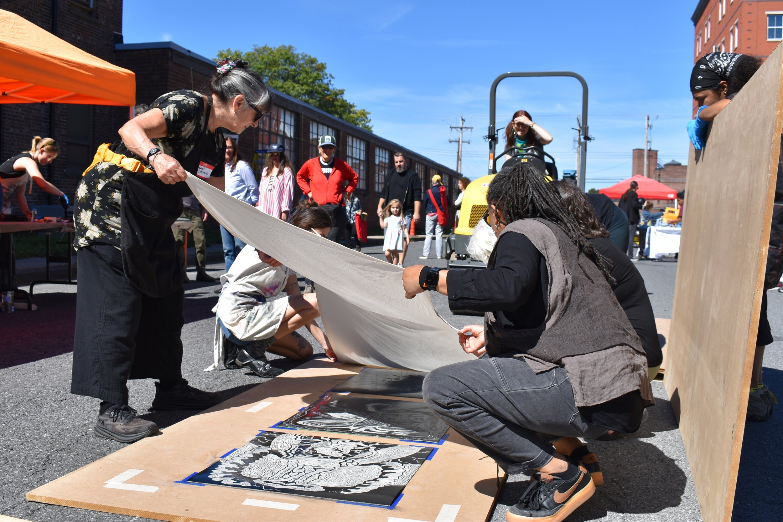 Artist preparing for a steamroller print