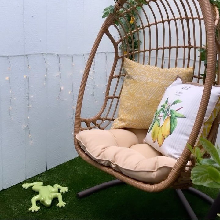 Summer time vibes - she loves faux plants projects 🌿🌱

DIY outdoor wall decor - made a frame with chicken wire + accessorized with a variety of faux plants. 

Spruced up a hanging egg chair with more faux plants. 

Lights on the wall - repurposed x