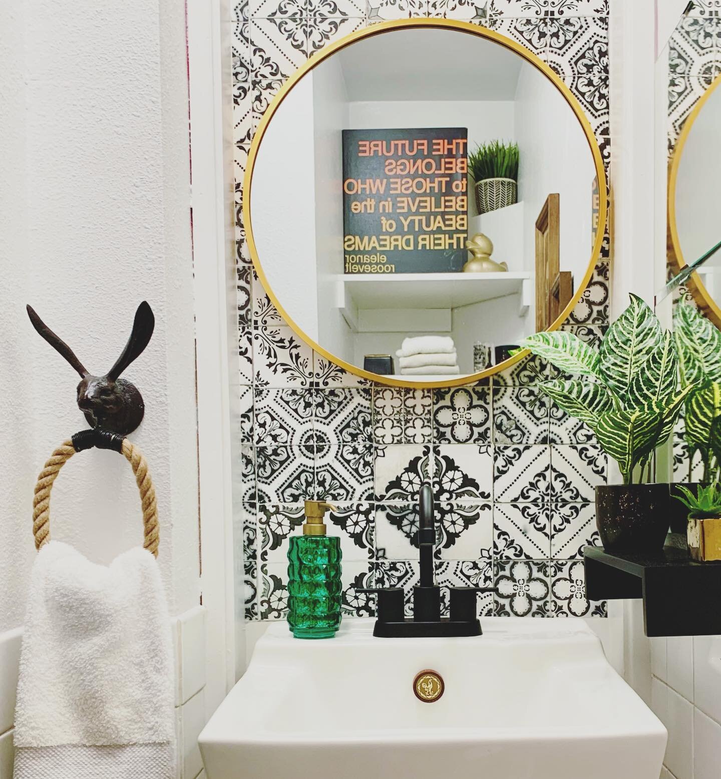 Before and afters of a tiny bathroom makeover. 

It&rsquo;s not tile, it&rsquo;s decal. The black and white Spanish &ldquo;tiles&rdquo; creates a focal point, draws your eye up, and highlights the height of the bathroom which makes the room appear to