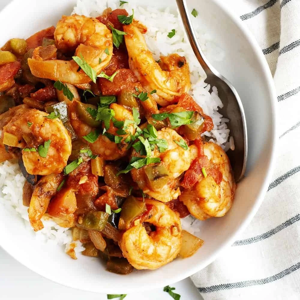 Shrimp-Creole-over-rice-served-in-a-white-bowl-featured.jpg