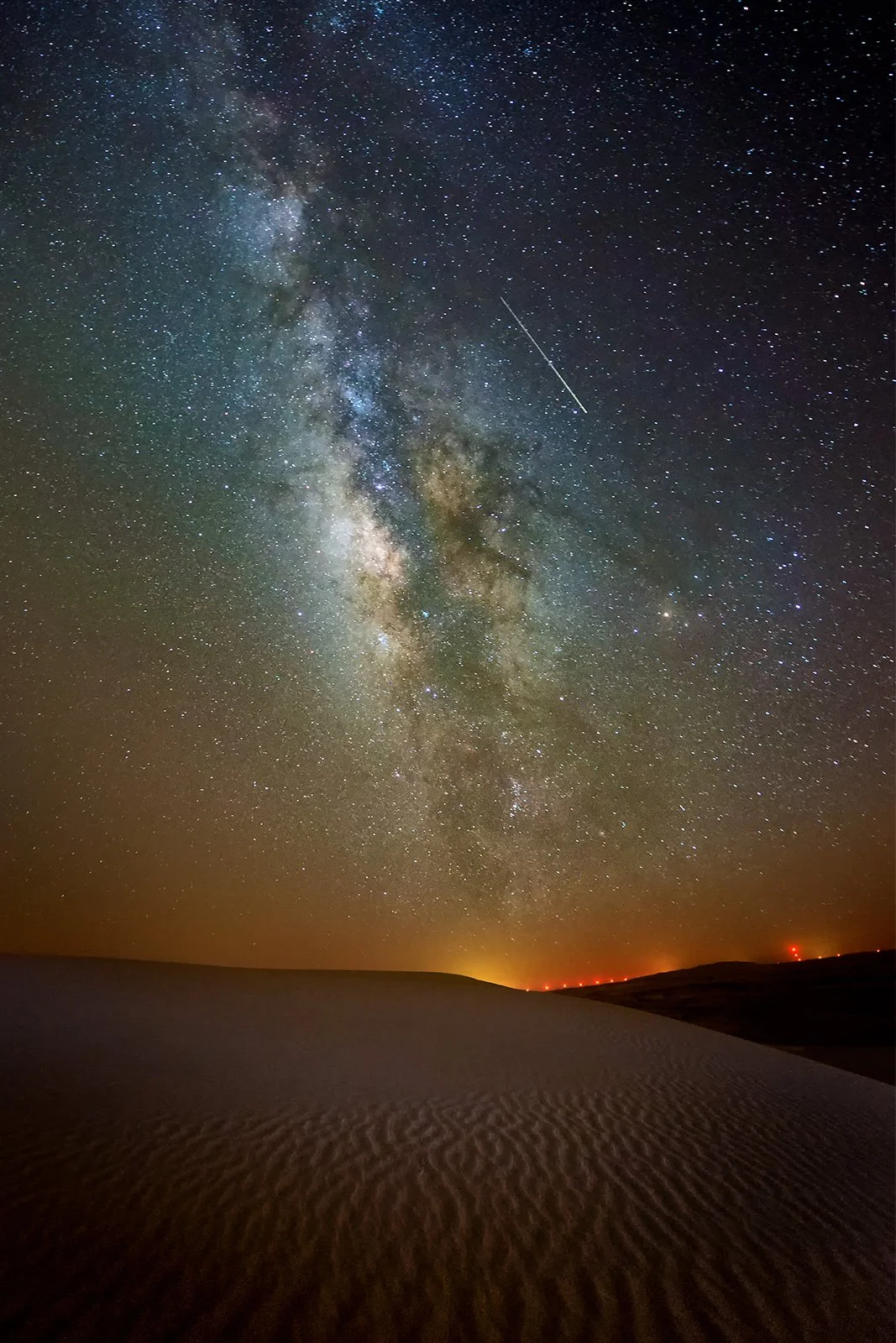 High resolution astrophotography showing vibrant dust lanes of the Milky Way core in Qatar desert by Hammad Iqbal