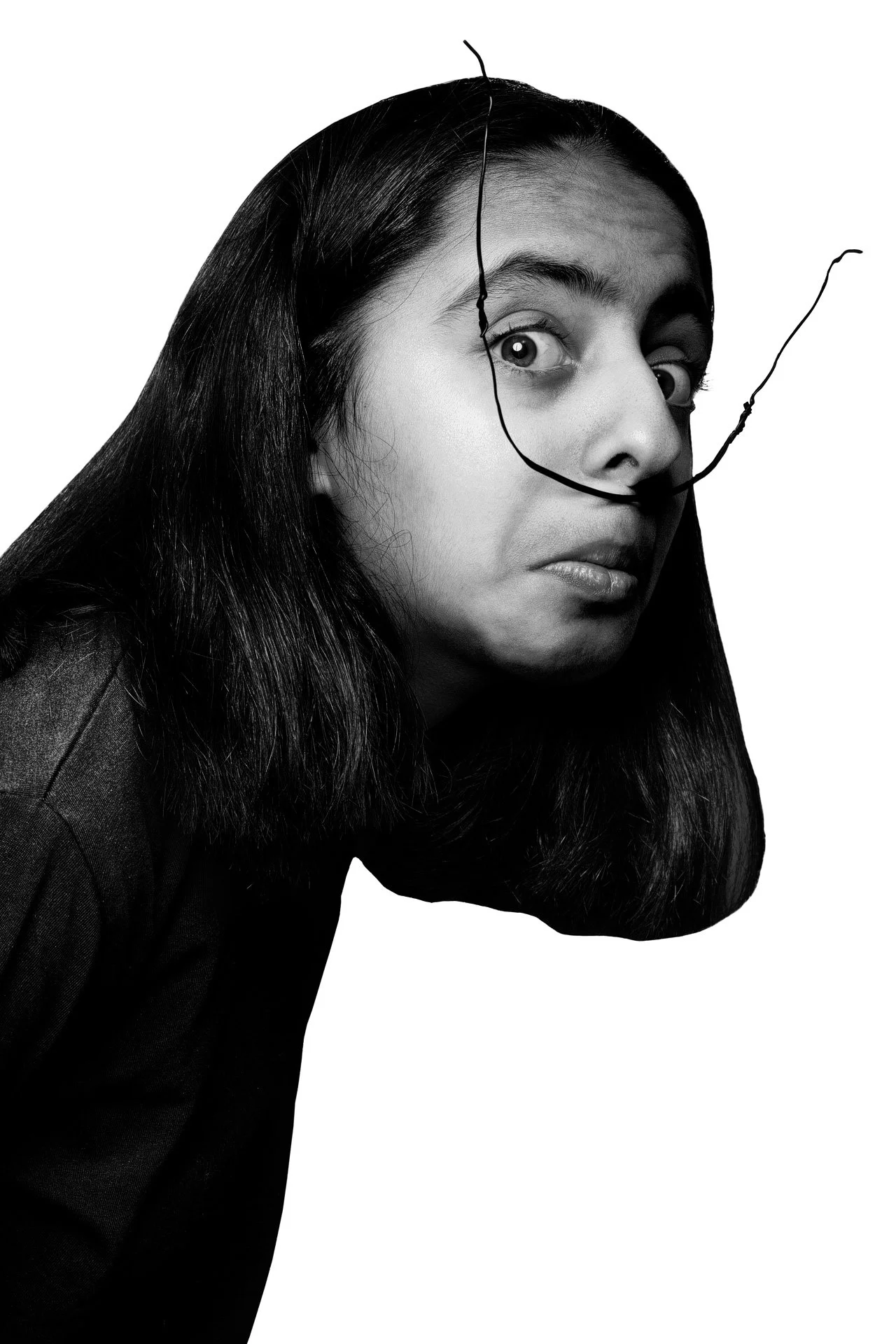 Surreal black and white portrait featuring exaggerated Dali mustache wire optical illusion by Hammad Iqbal