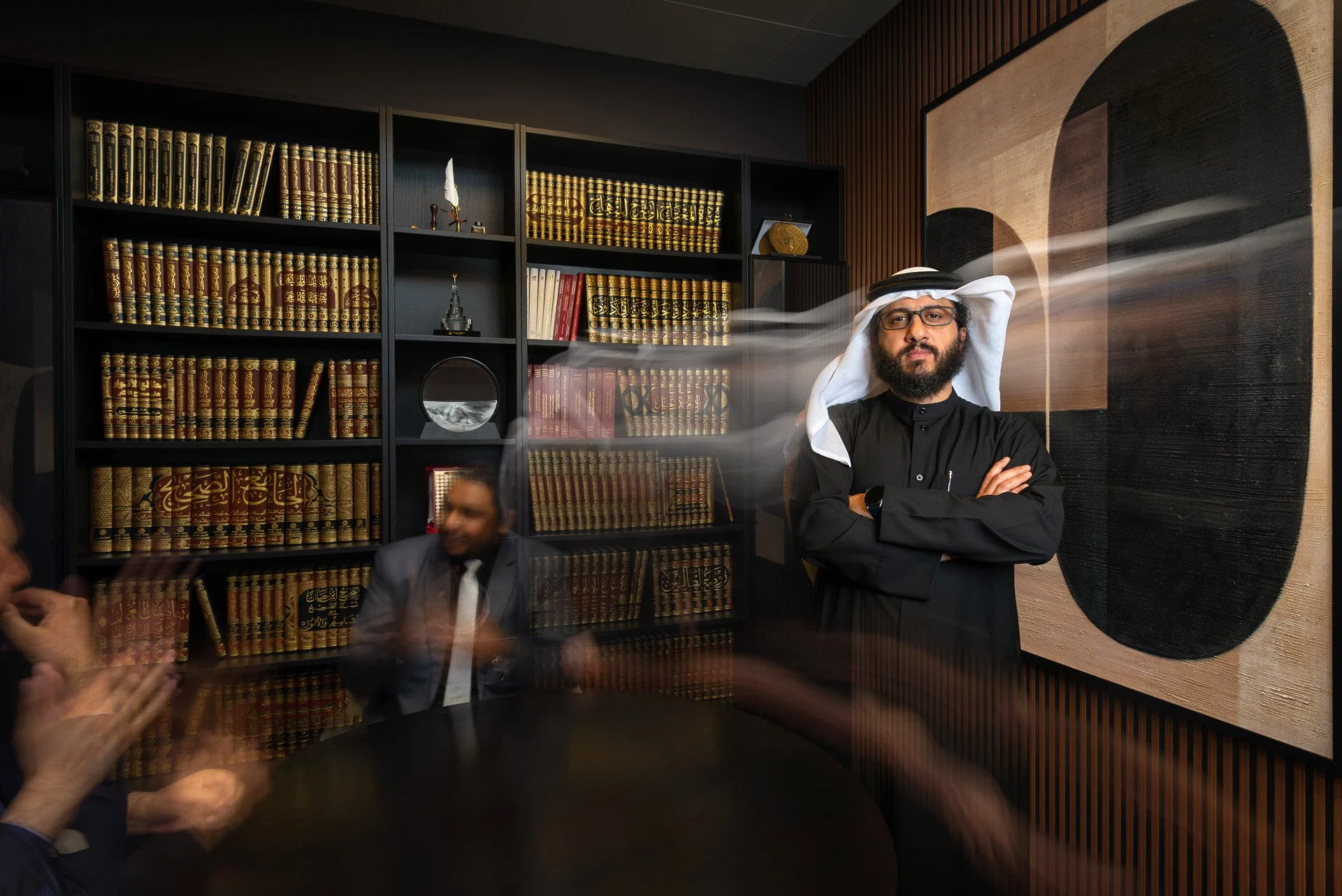 Thumbnail for environmental portrait of attorney Abdulla Mohammed Al-Mulla in his legal office library with books in Doha by Hammad Iqbal