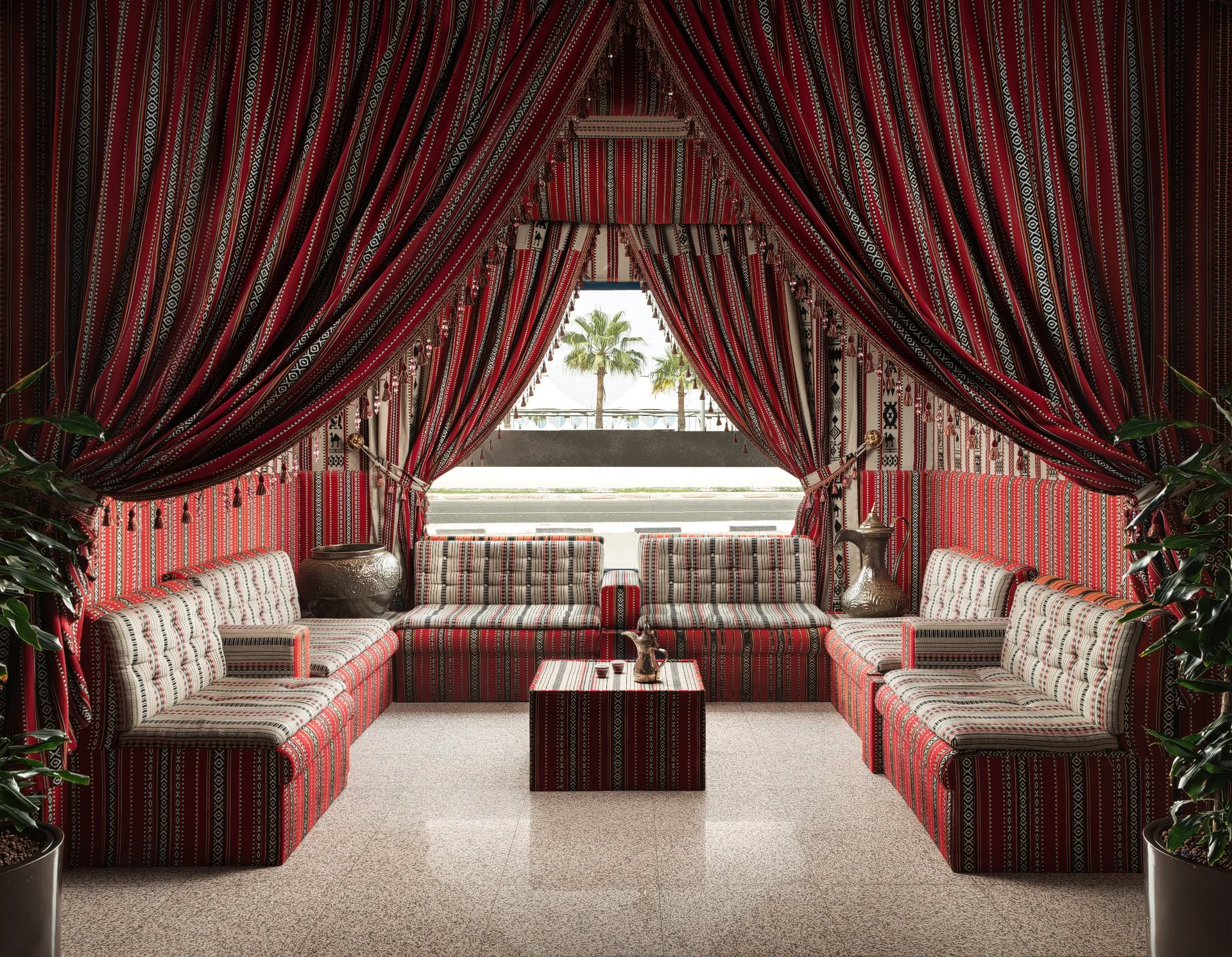 Architectural interior photo of a luxury traditional Qatari majlis with red Sadu fabrics by Hammad Iqbal