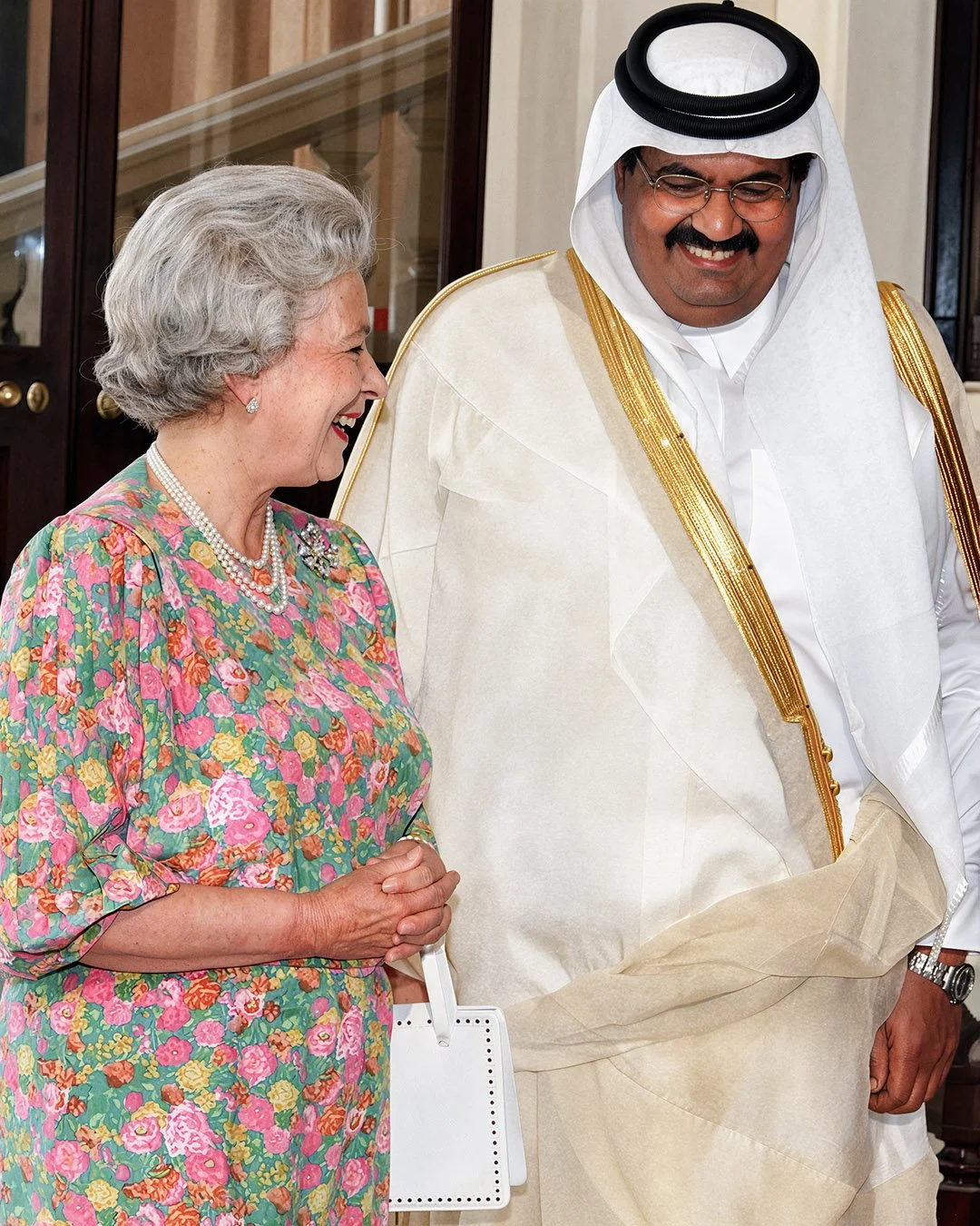  Reconstructed Image — Diplomatic state visit featuring Father Amir His Highness Sheikh Hamad bin Khalifa Al Thani alongside Queen Elizabeth II. 