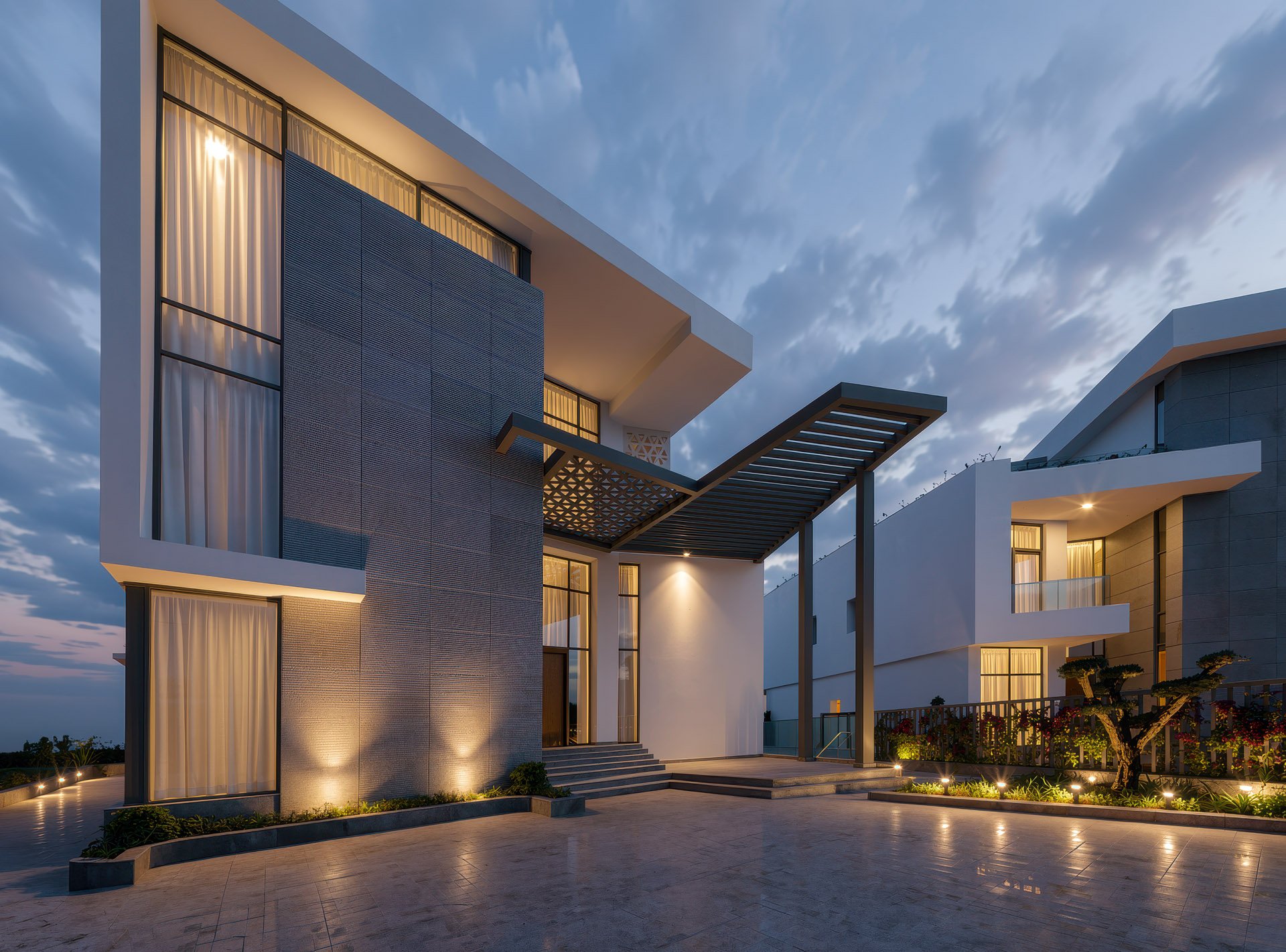 Twilight architectural photography of luxury villa exterior showing facade accent lighting at The Pearl Qatar by Hammad Iqbal
