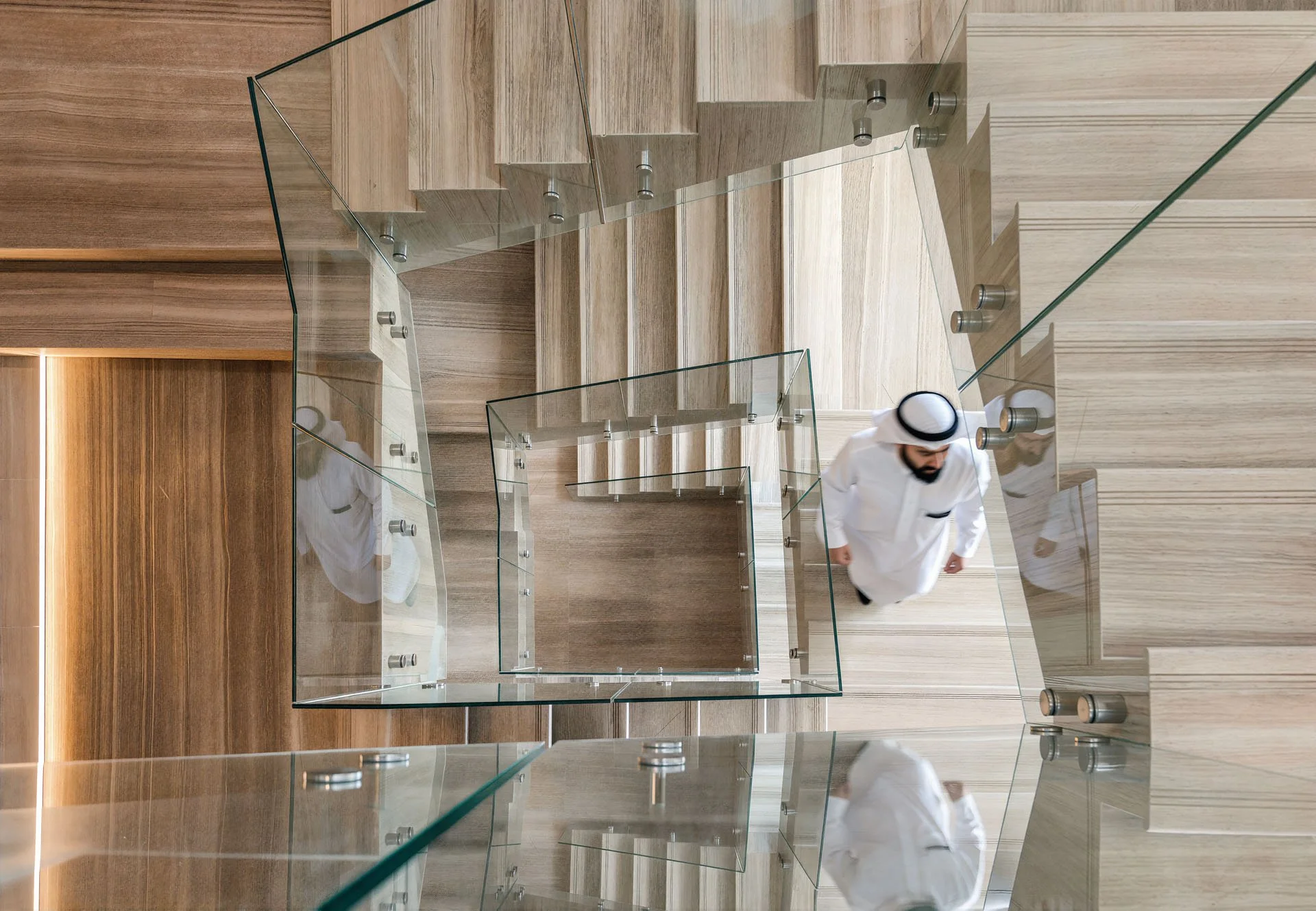 Top down architectural perspective of floating timber stairs and geometric glass balustrade by Hammad Iqbal