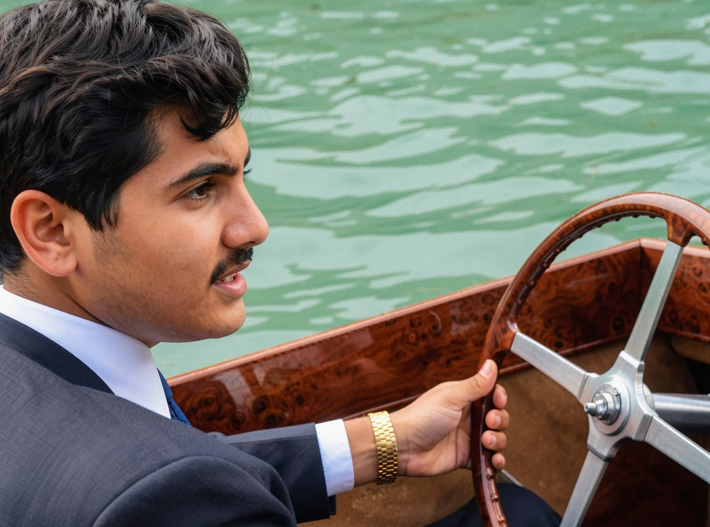  Reconstructed Image — Young His Highness Sheikh Hamad bin Khalifa Al Thani navigating a wooden speedboat in Qatar. 