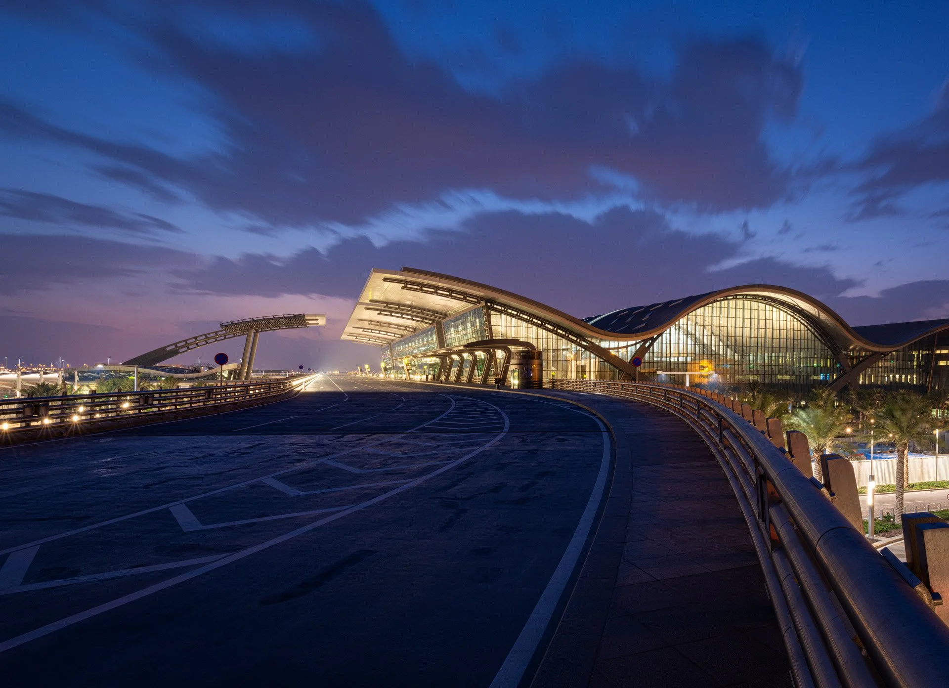 Twilight architectural photography of Hamad International Airport terminal exterior in Doha by Hammad Iqbal