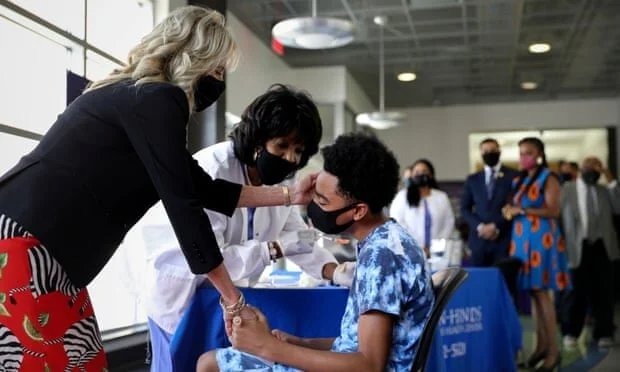 Figure 2: Joe and Jill Biden independently visited vaccination sites across the US South to increase vaccine confidence. Photograph: Tom Brenner/Reuters