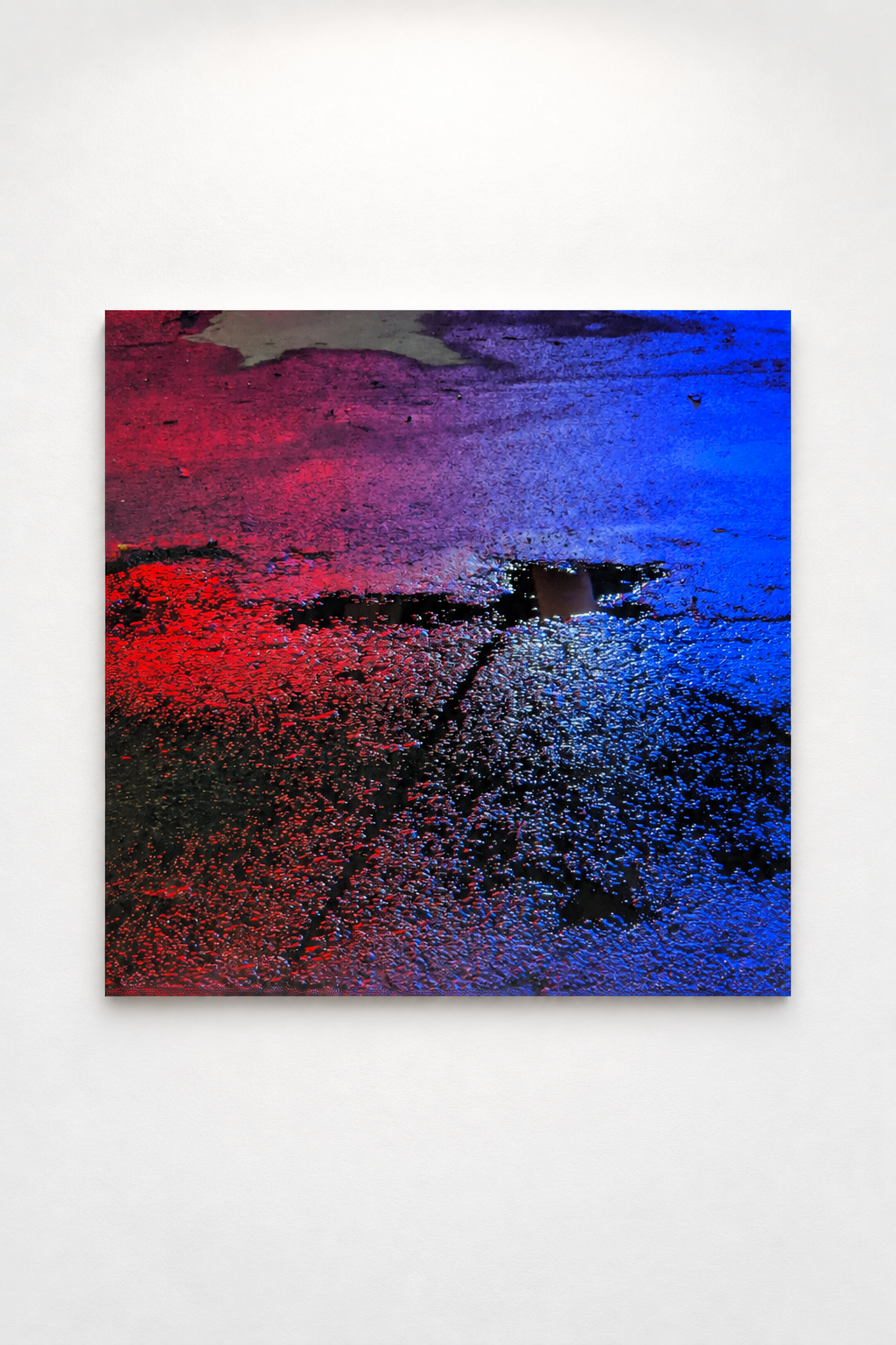 Chromatic puddles on wet asphalt.png
