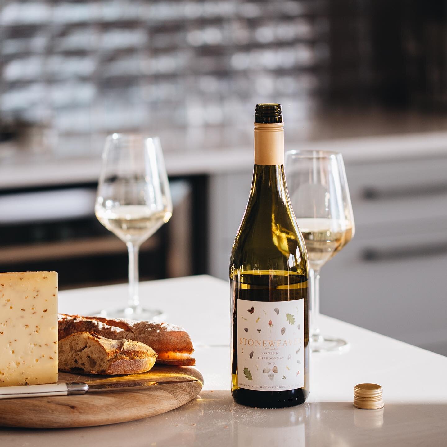 Bright, green gold in the glass leads to light peach, toasty oak aromatics with a smooth blend of peach, citrus and subtle mineralty on the palate. 
This is Stoneweaver by Huia. 

#stoneweaverwine #marlboroughnz #chardonnay #organicwine #veganwine