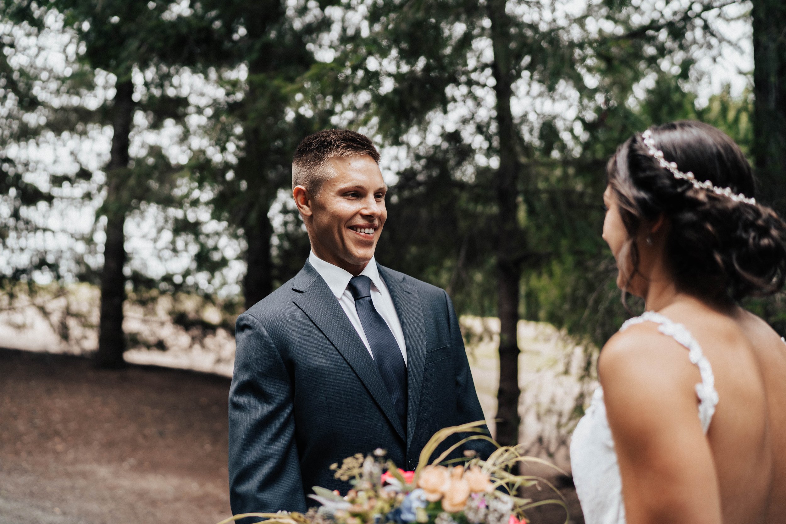 Seanna &amp; Damian wedding groom greets bride- Trinity Pines Ranch