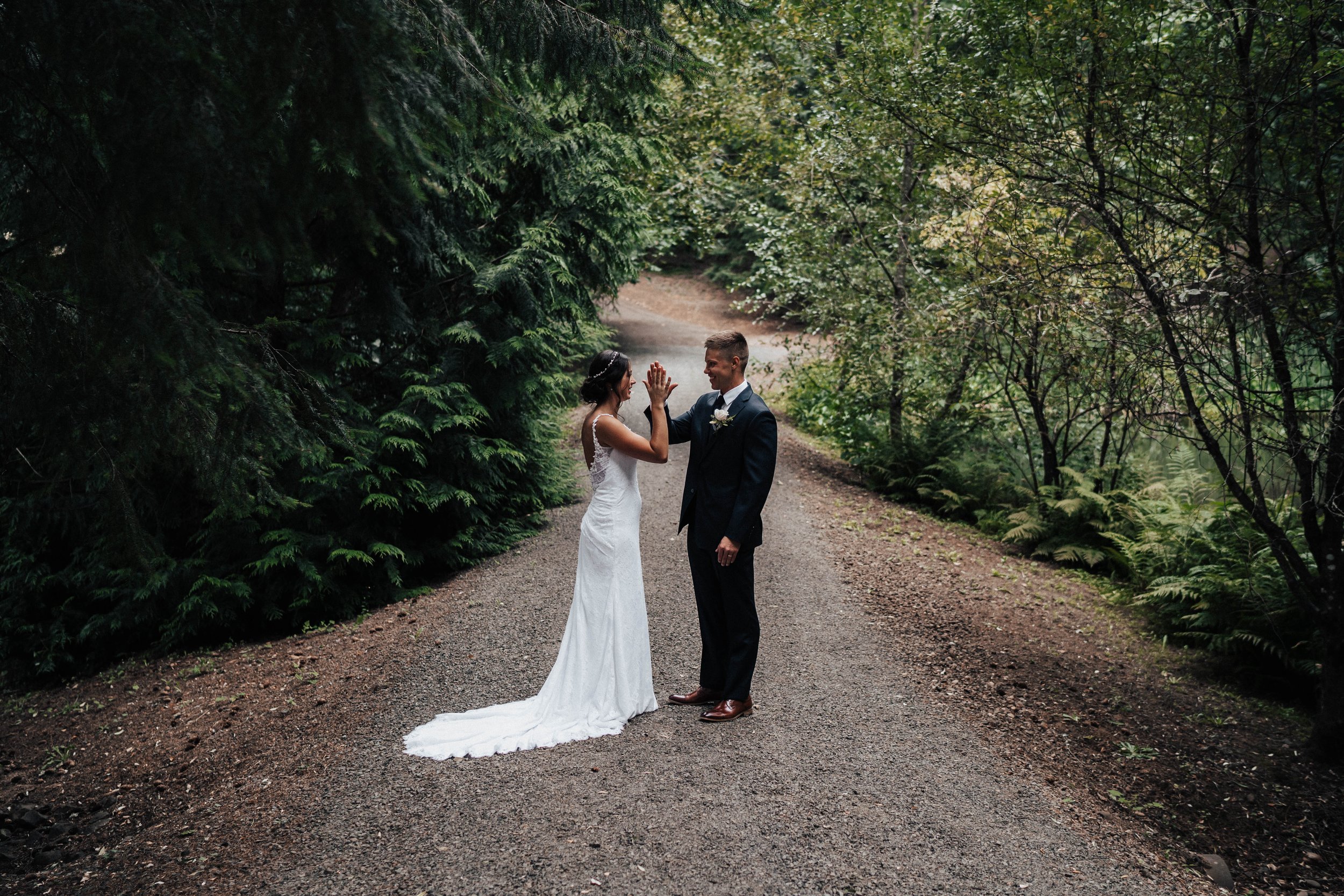 Seanna &amp; Damian bride &amp; groom walking- Trinity Pines Ranch