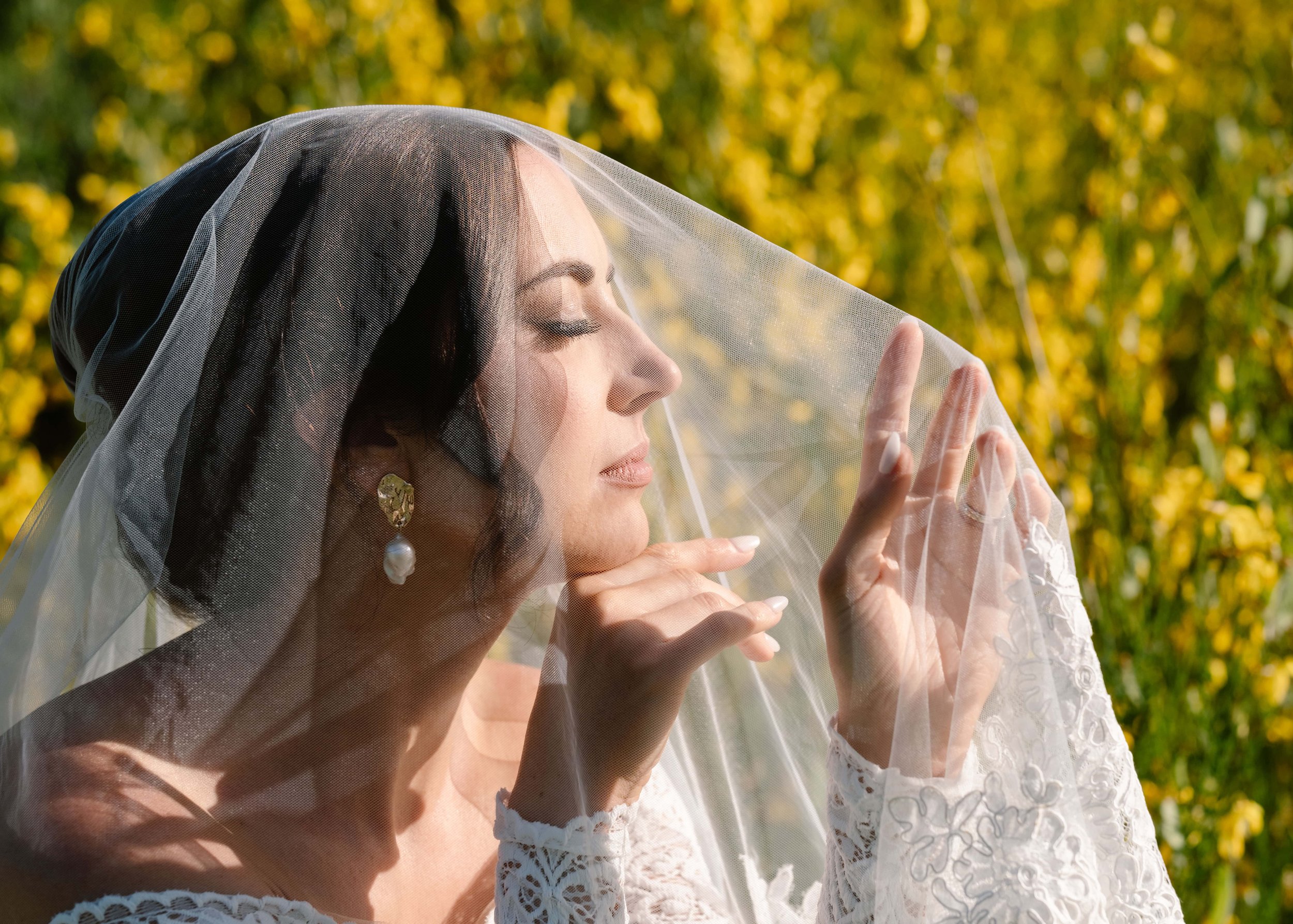 Bride in wildflowers at Leavenworth wedding venue