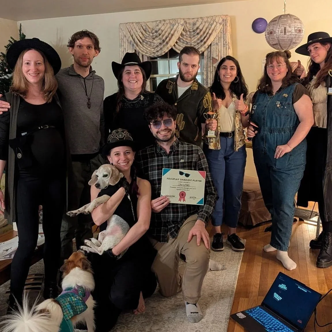 Photo of the group from the evening, complete with awards and dogs