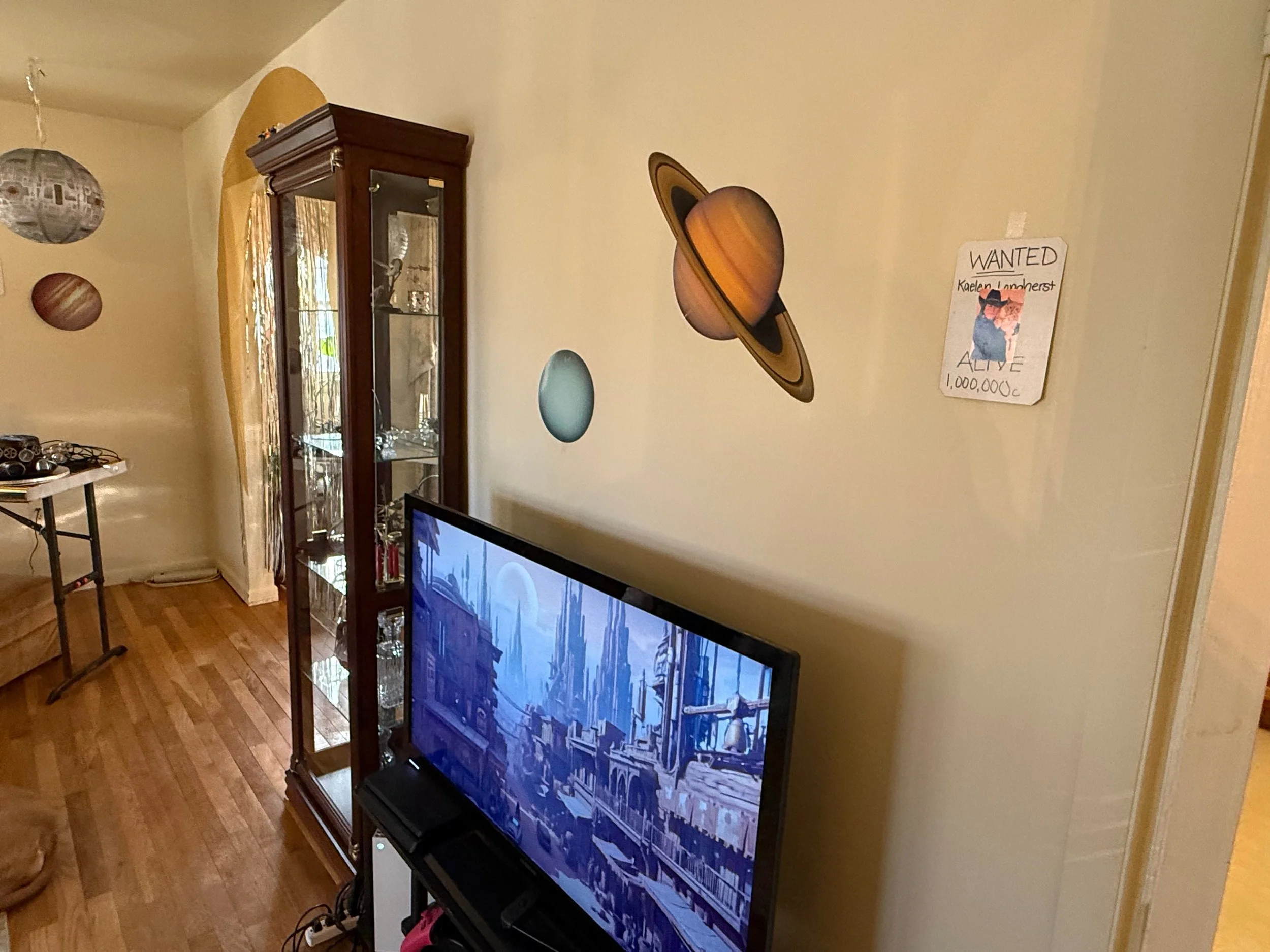 Thematic decor from the party, including wanted posters for Kaelen Longherst and space themed decor.