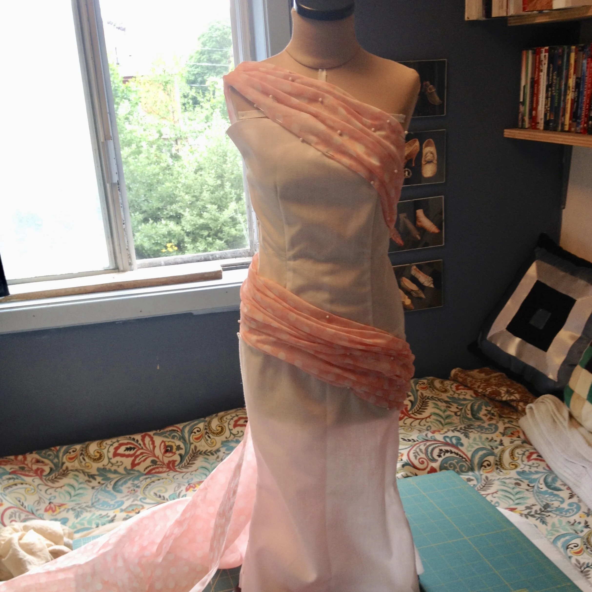 Practicing draping.
