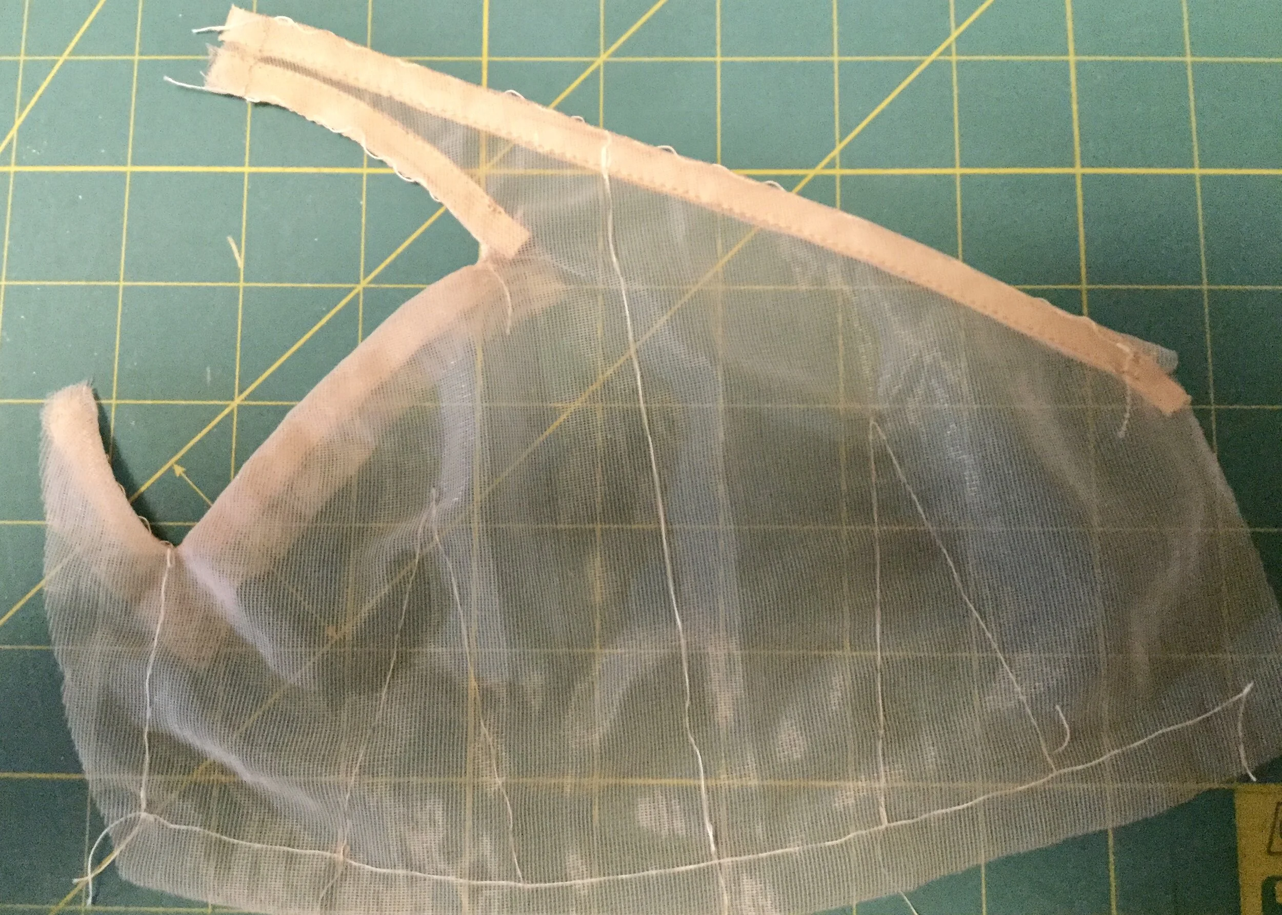Strap finished and underarm facing applied.