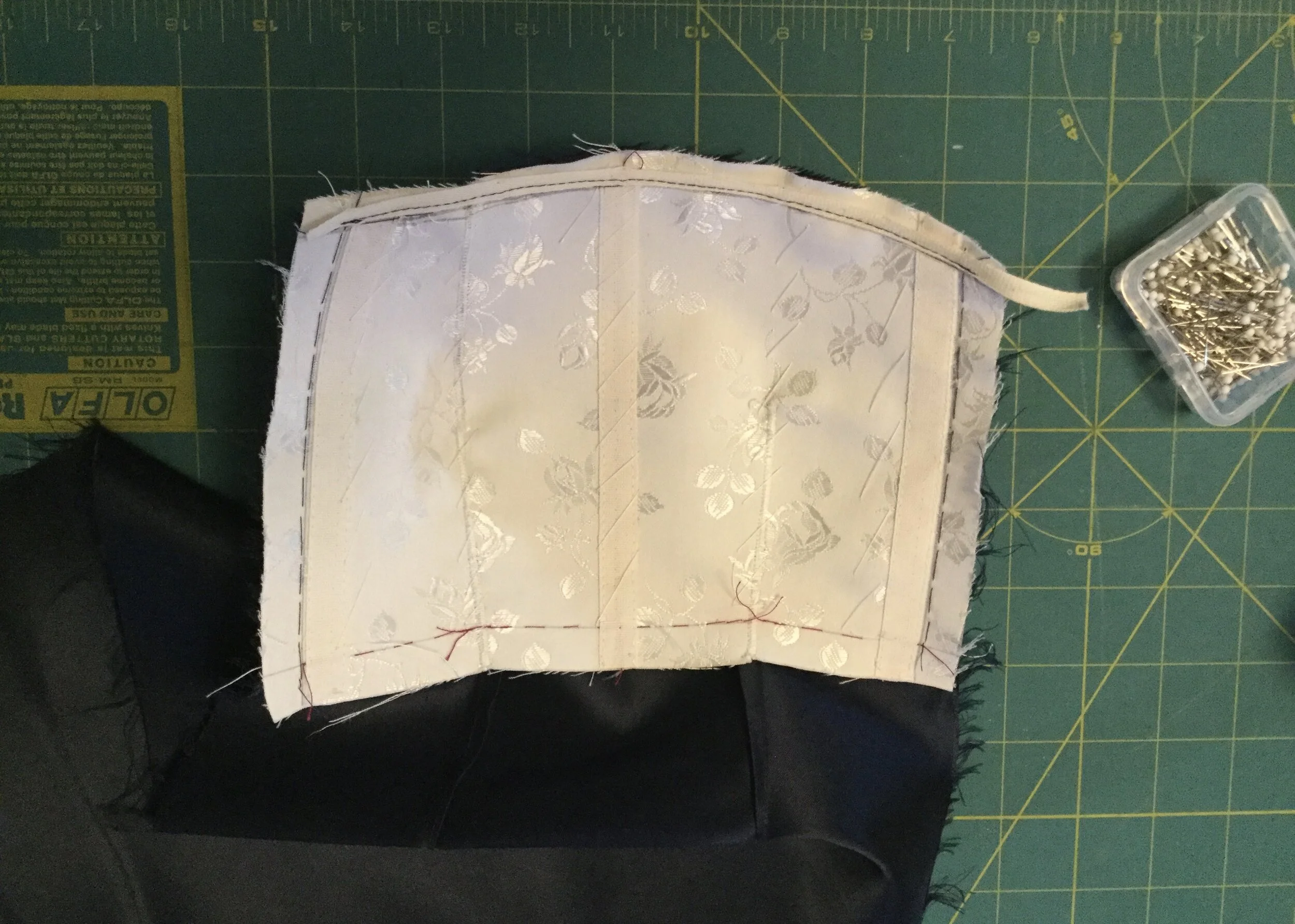 Flat mounted with tailor tape applied.