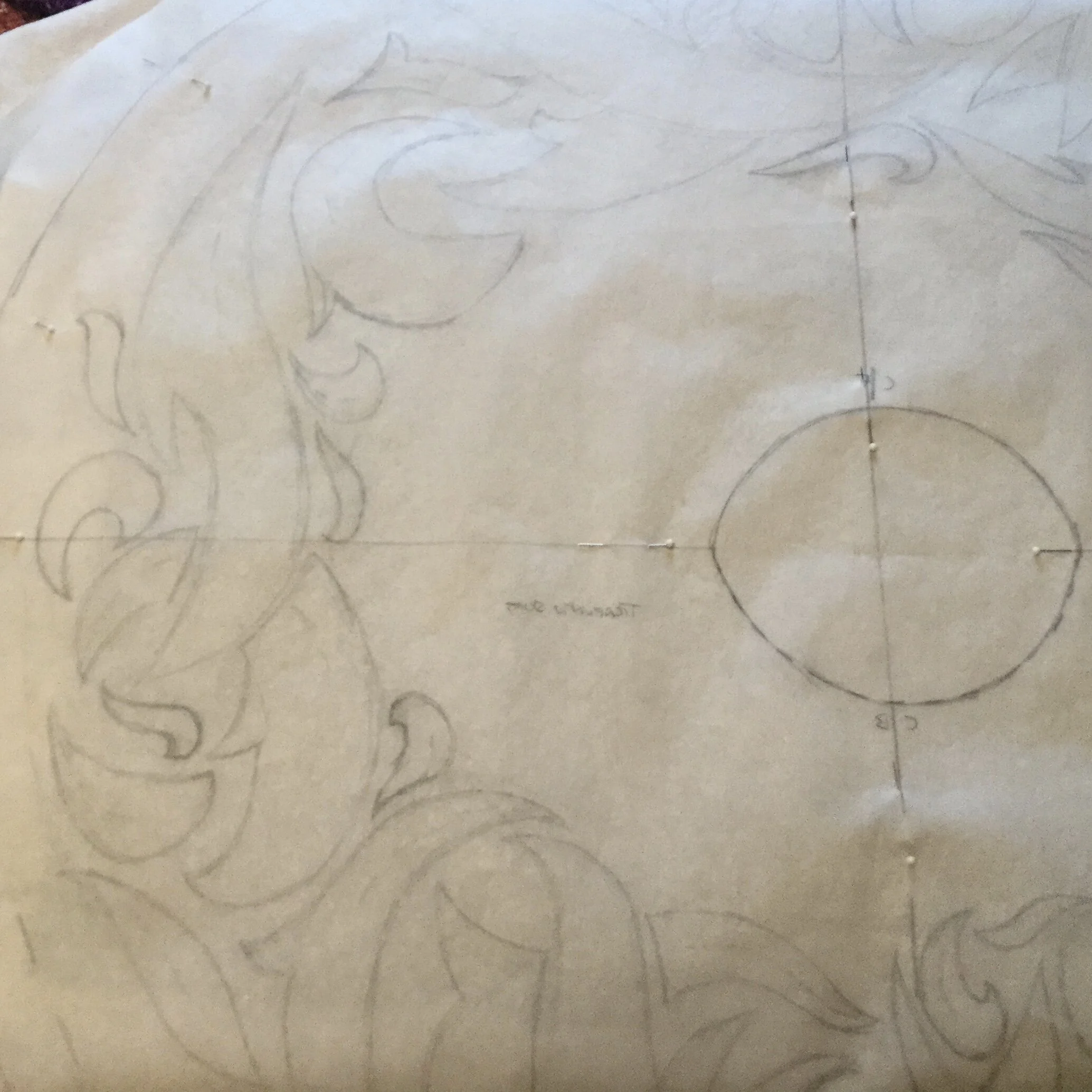 Pattern pinned to fabric.