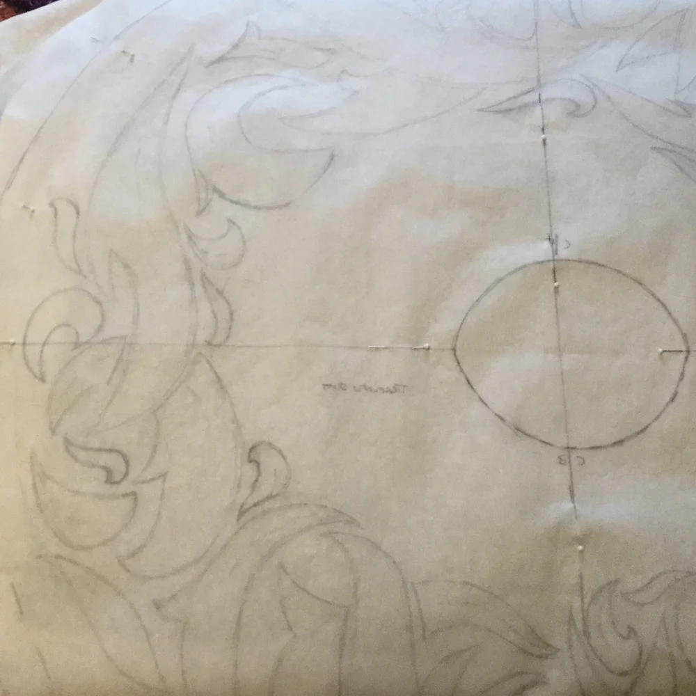 Pattern pinned to fabric.