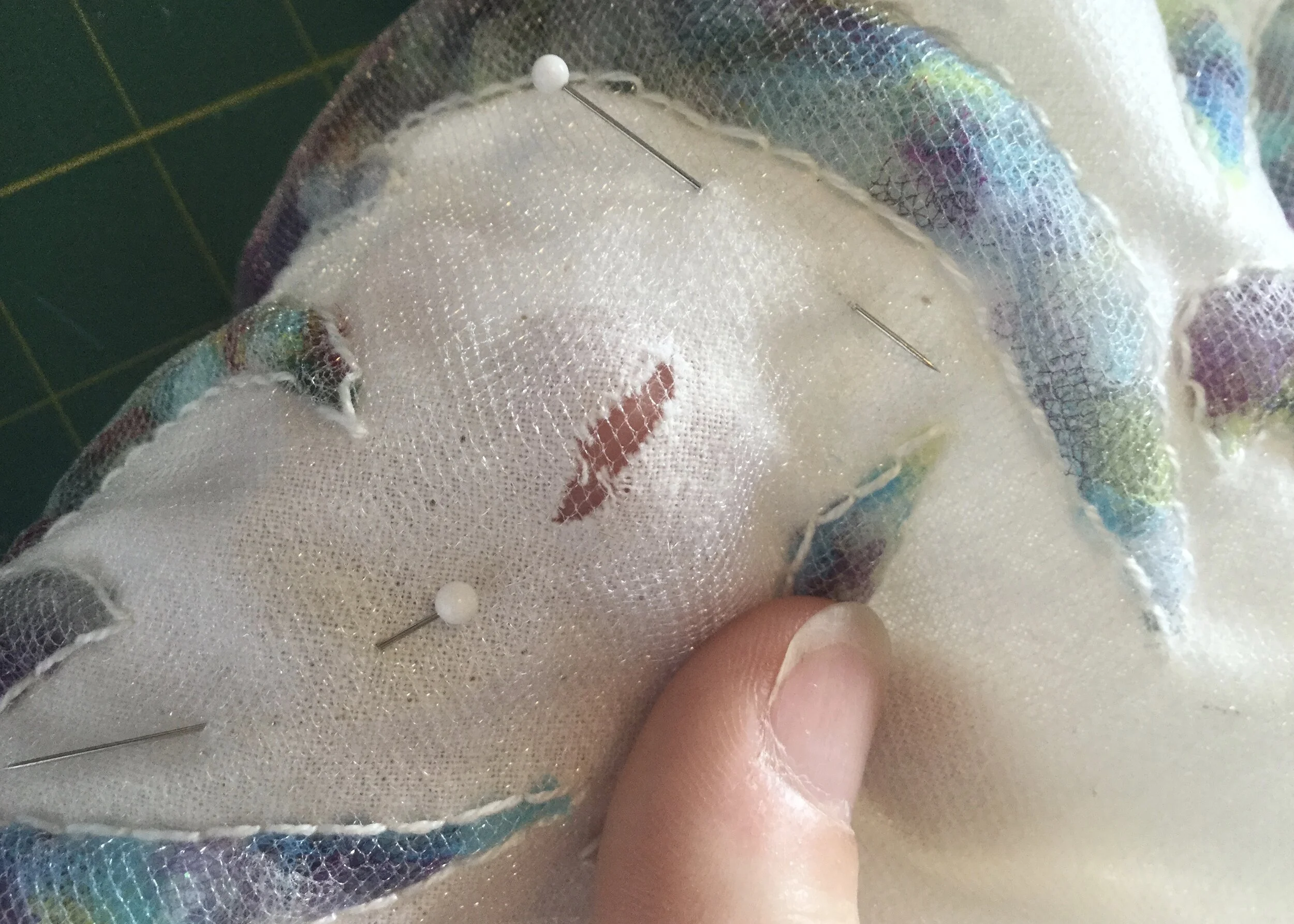 Surprisingly, white tulle under white tulle on white fabric is hard to see...