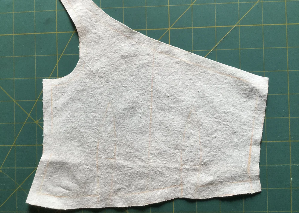 Cotton layer of bodice front.