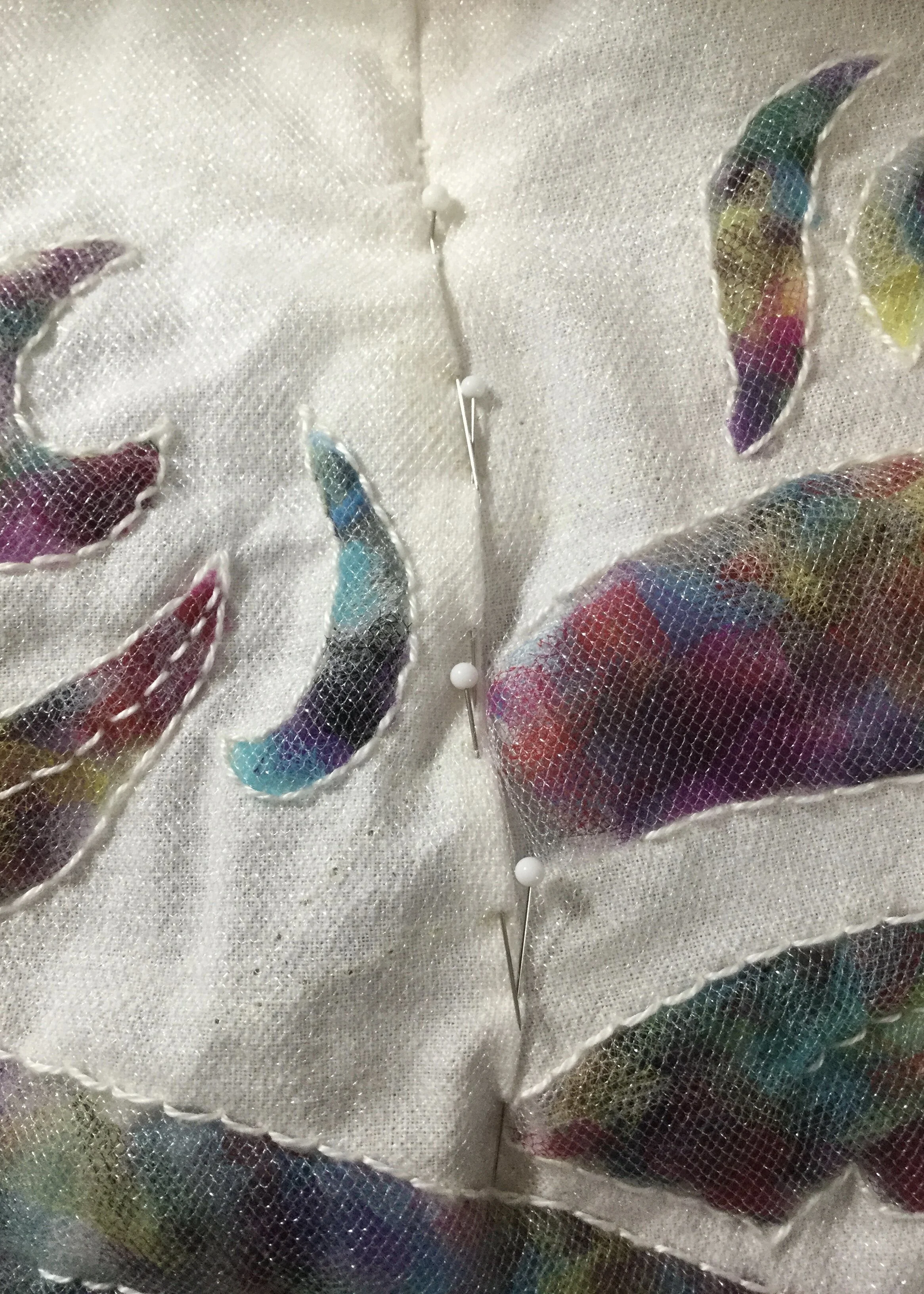 Pinning out excess and shaping.