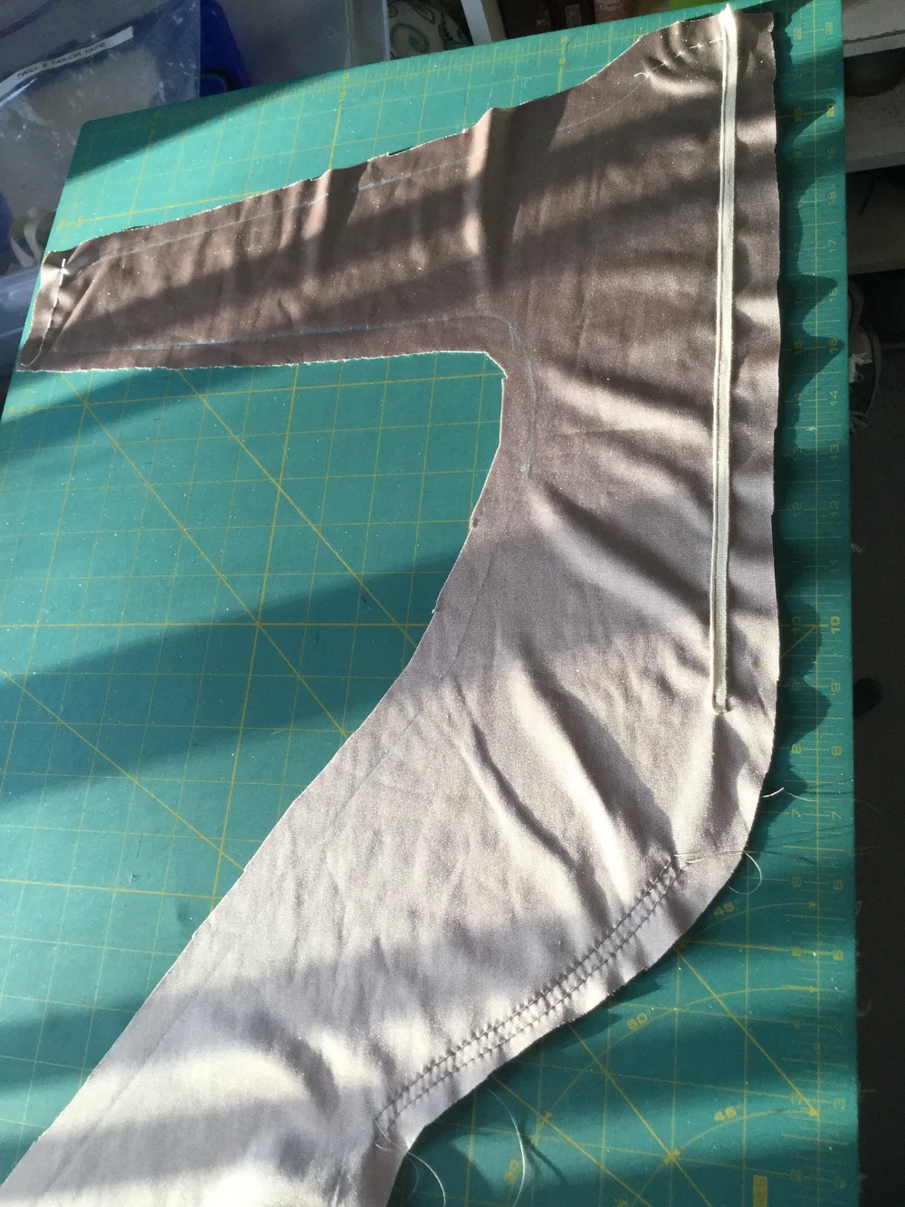 Back piece, prepped with tape and gathering stitches.