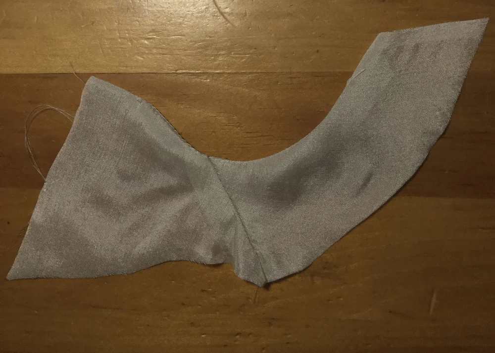 Unsuccessful facing in silk.