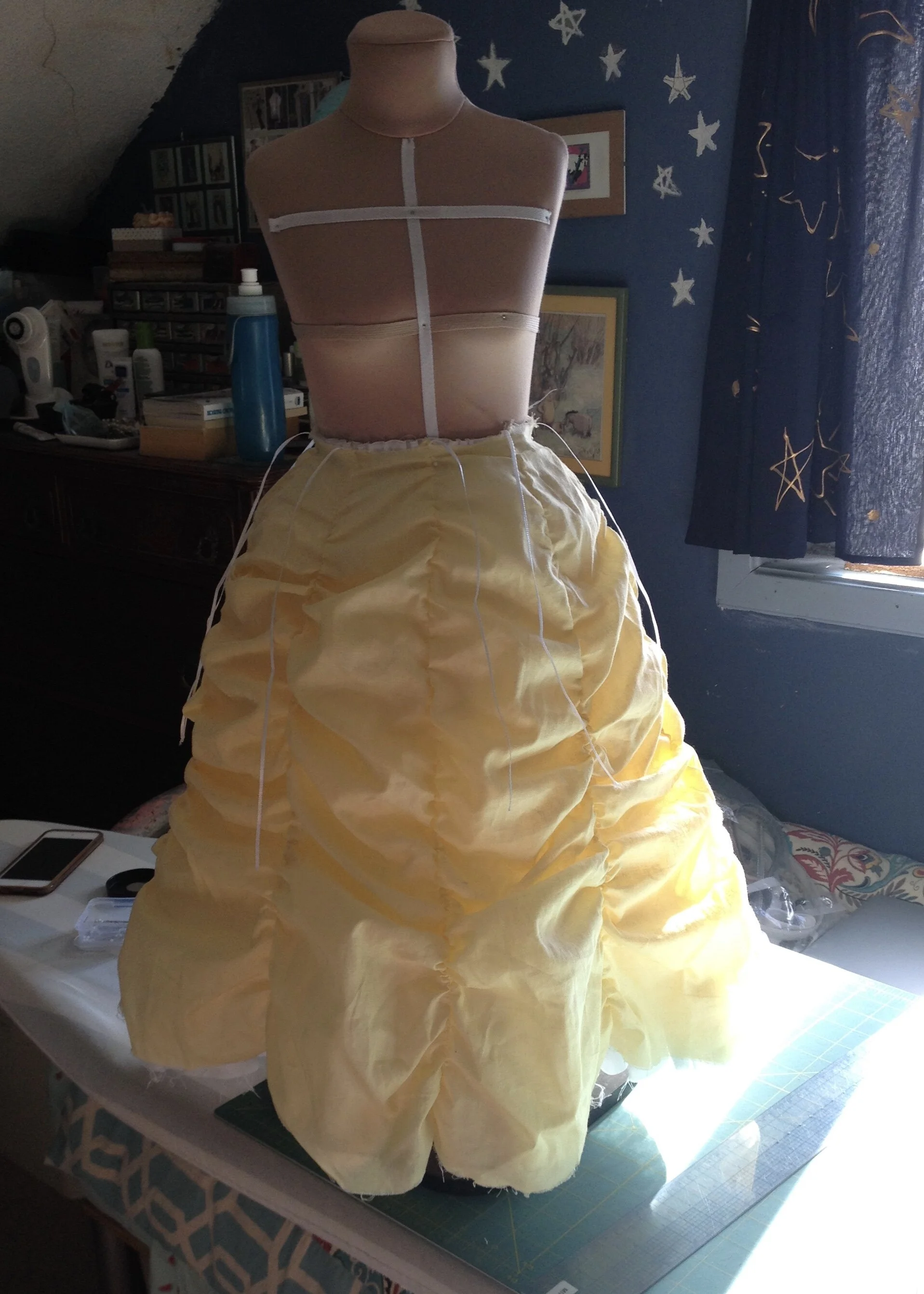 Shorter petticoat and drawn up a bit more.