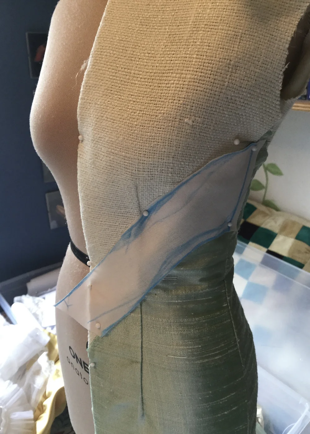 Checking it on the mannequin.