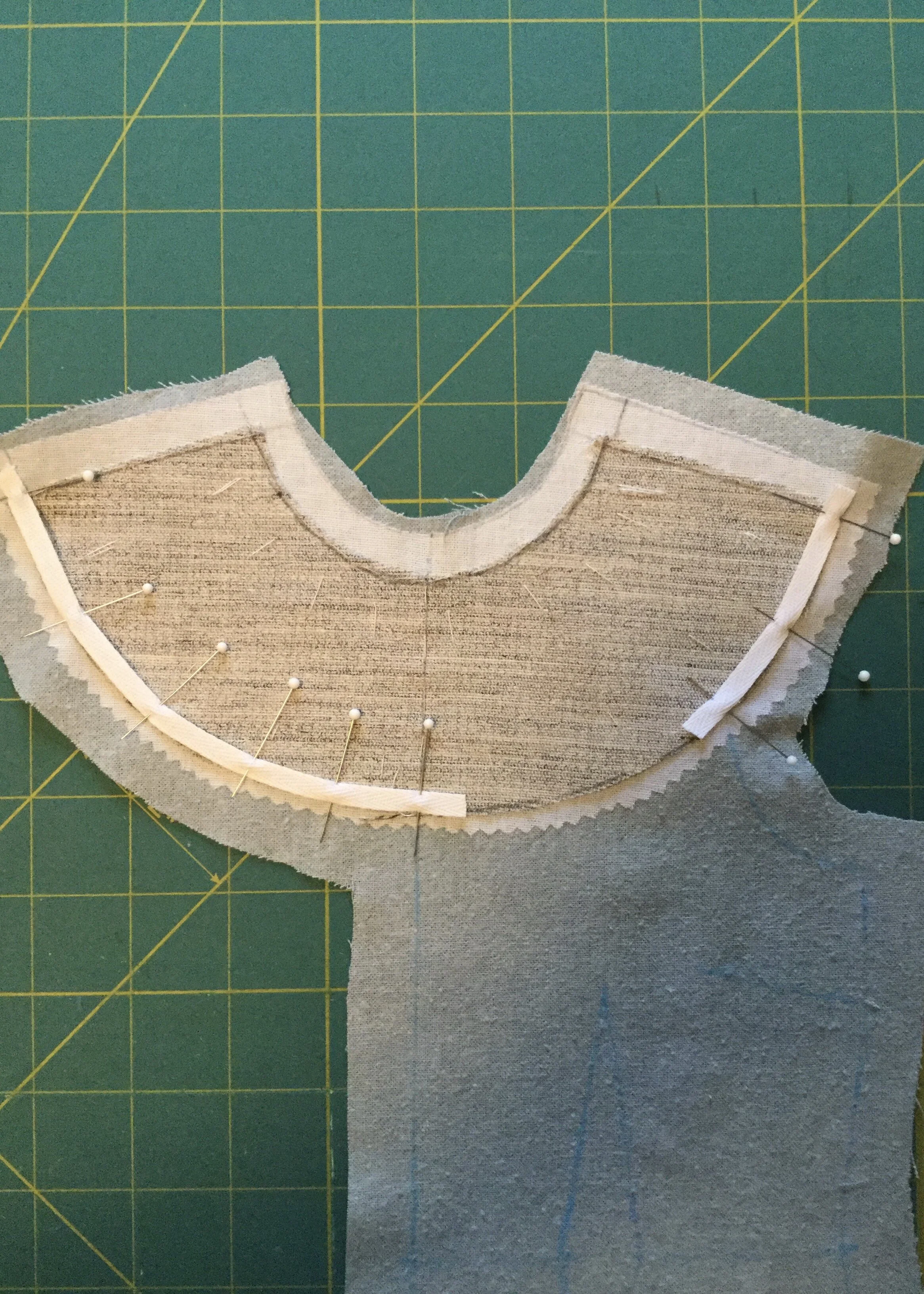 Twill tape pinned into place.